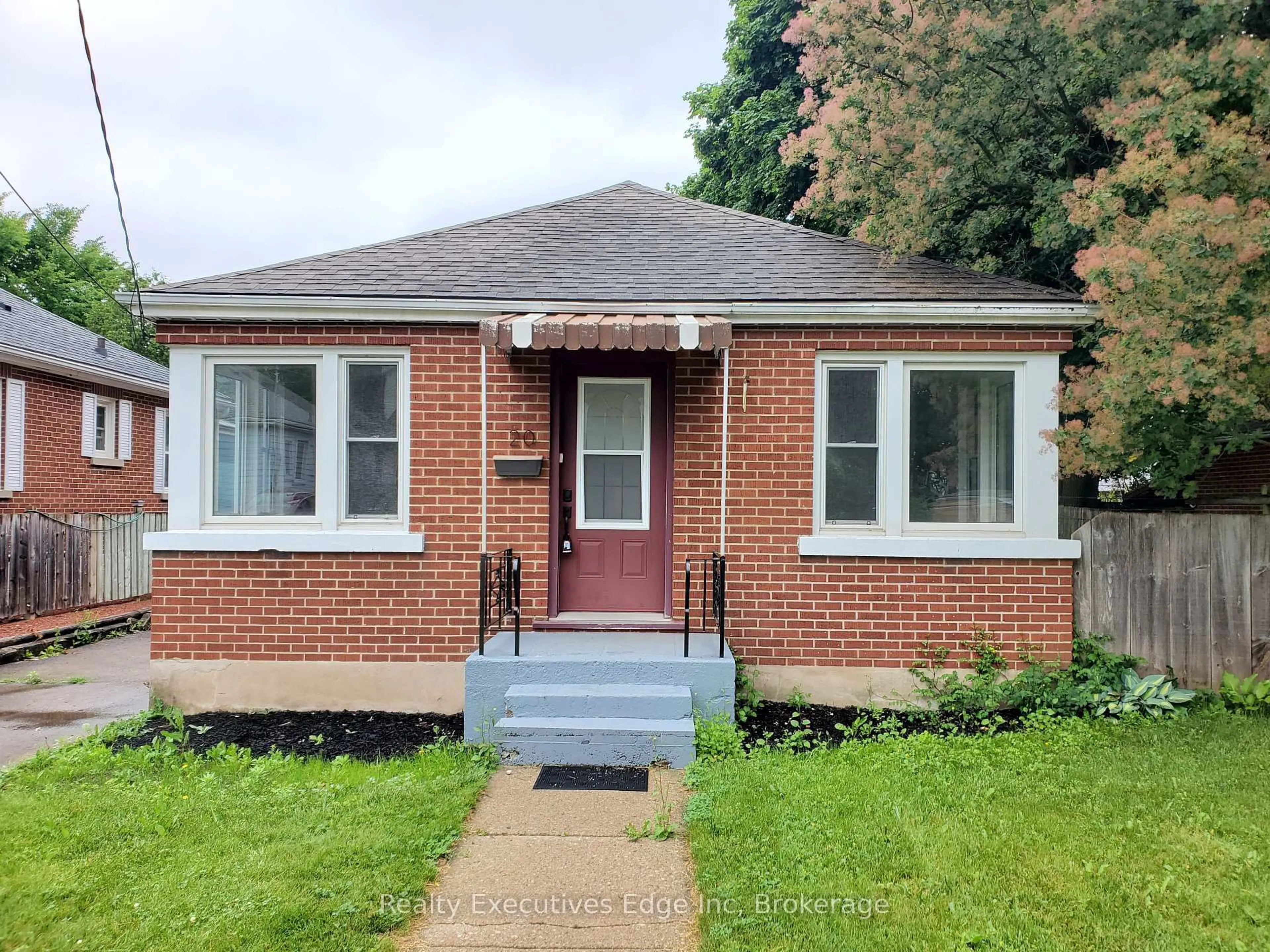 Home with brick exterior material, street for 20 Armstrong Ave, Guelph Ontario N1E 5W8