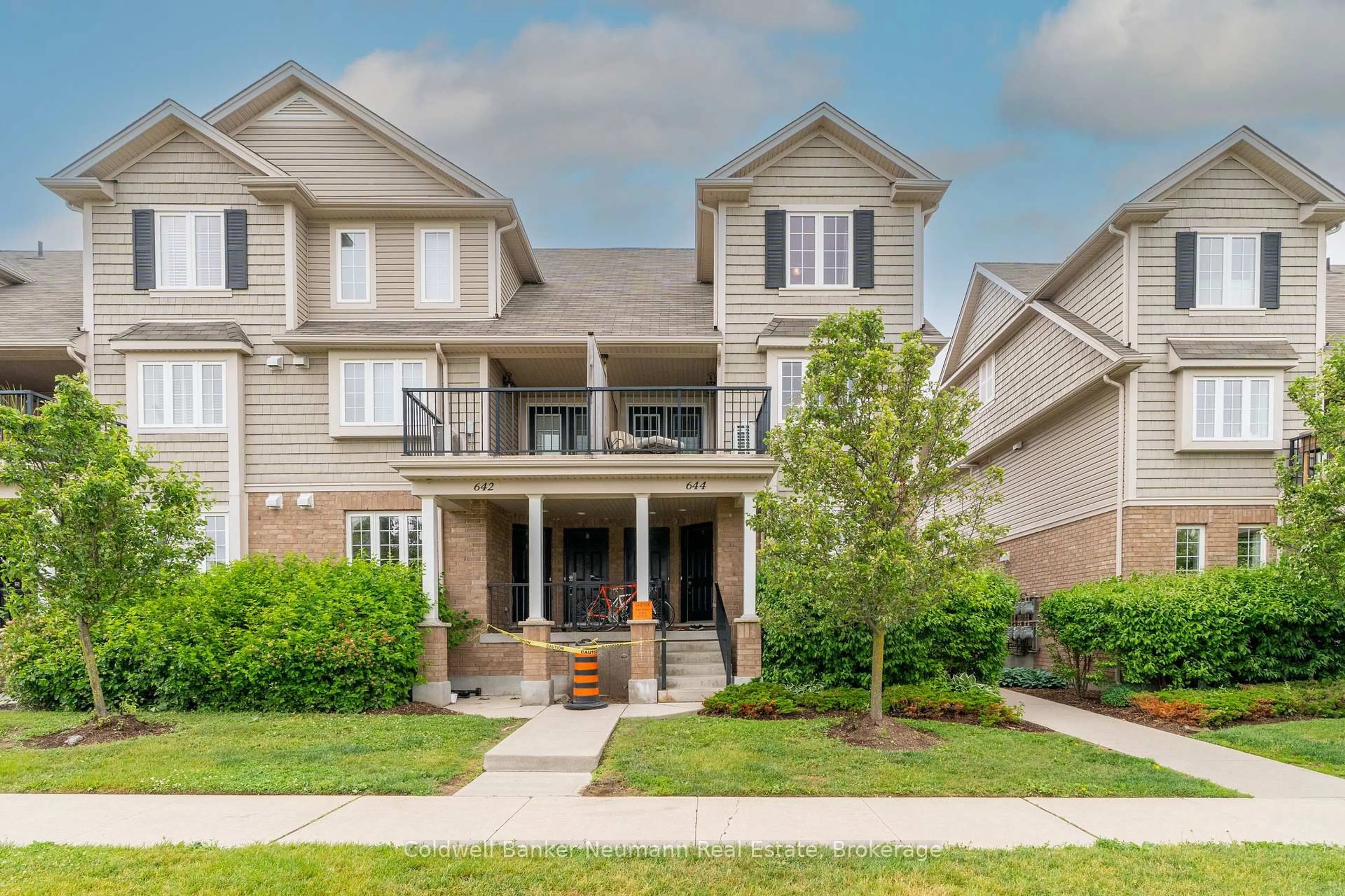 Home with brick exterior material, street for 644 Woodlawn Rd #A, Guelph Ontario N1E 0K4
