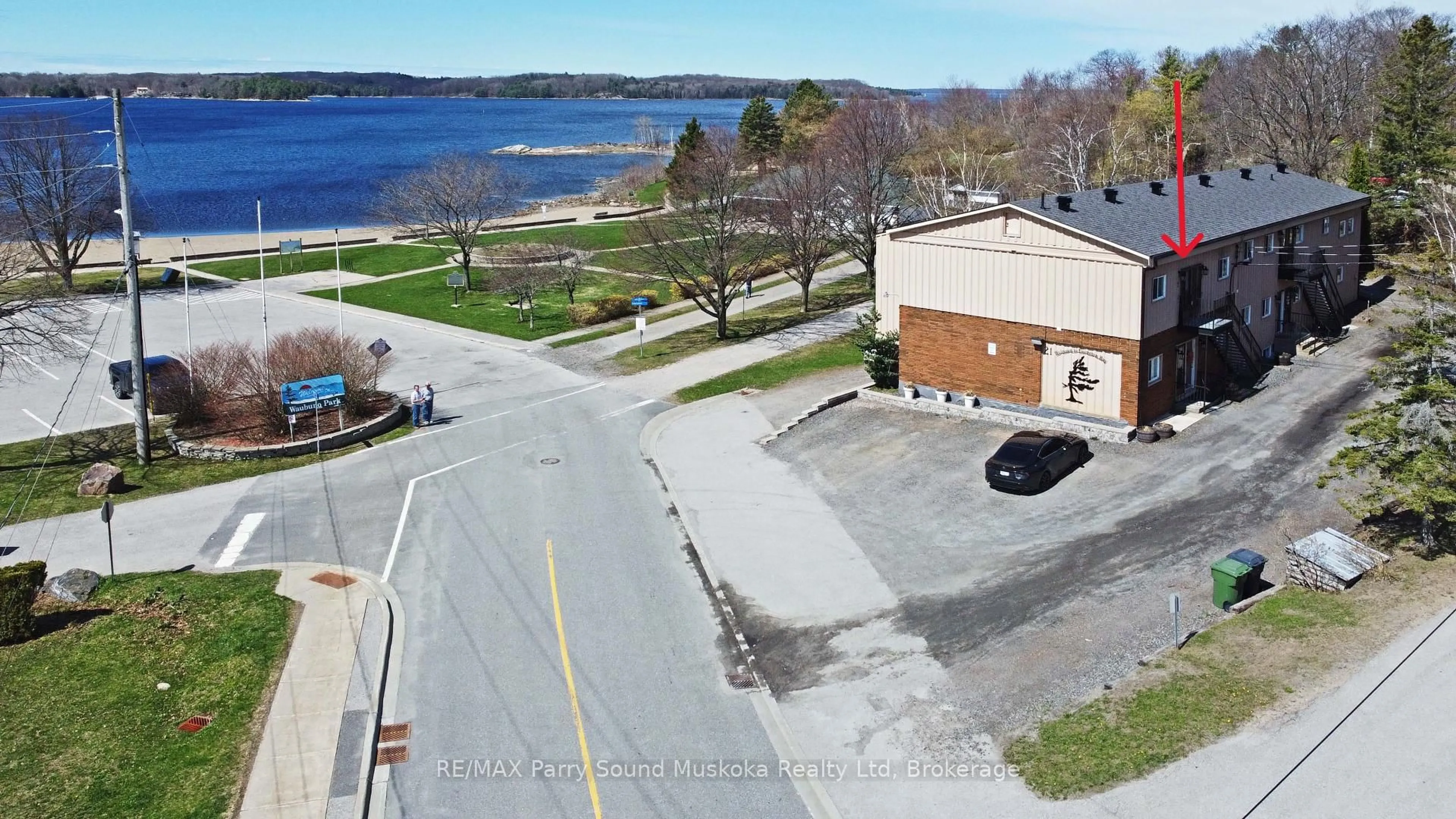 A pic from outside/outdoor area/front of a property/back of a property/a pic from drone, water/lake/river/ocean view for 21 Prospect St #7, Parry Sound Ontario P2A 2B5