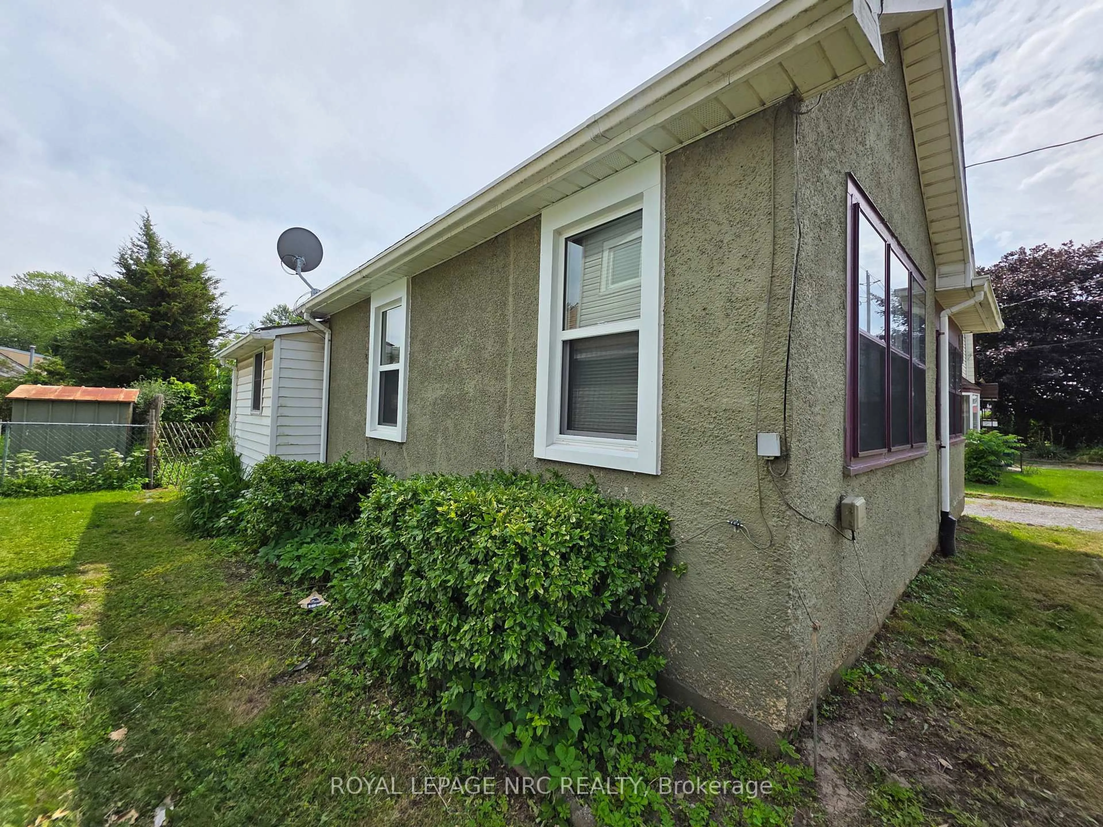 A pic from outside/outdoor area/front of a property/back of a property/a pic from drone, street for 103 Main St, Port Colborne Ontario L3K 1S3