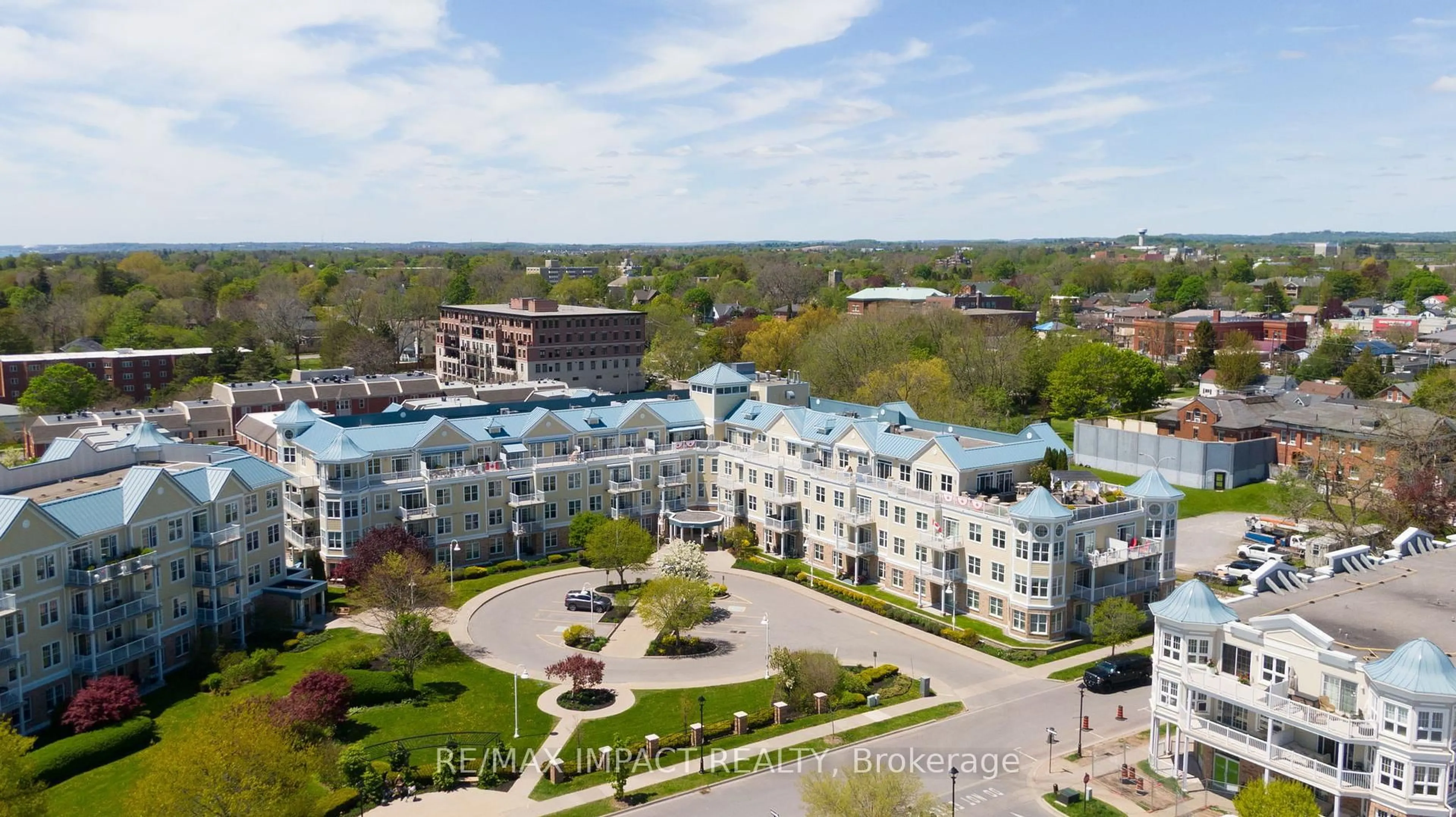 A pic from outside/outdoor area/front of a property/back of a property/a pic from drone, water/lake/river/ocean view for 145 Third St #108, Cobourg Ontario K9A 5X1