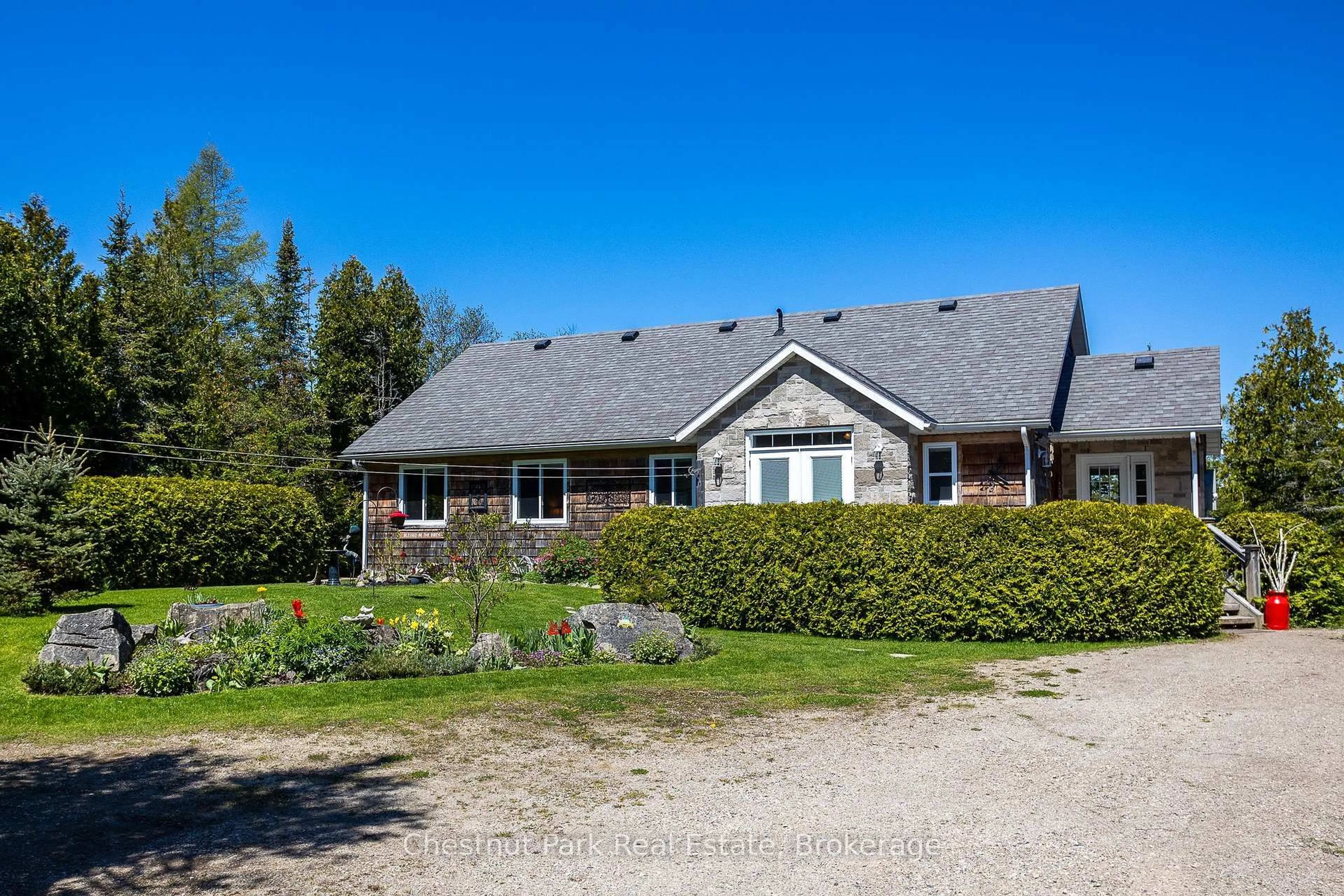 A pic from outside/outdoor area/front of a property/back of a property/a pic from drone, unknown for 94 Zorra Dr, Northern Bruce Peninsula Ontario N0H 2R0