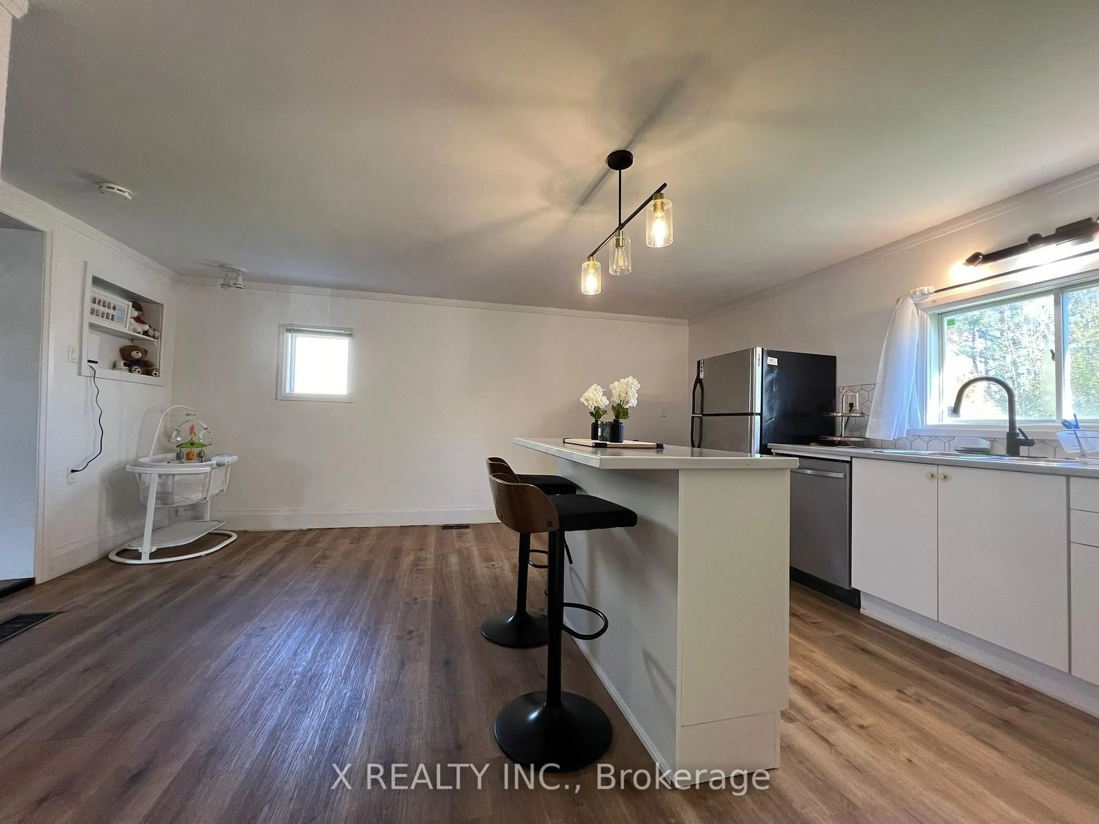 Open concept kitchen, wood/laminate floor for 41 Baldwin St, Belleville Ontario K8P 2V2