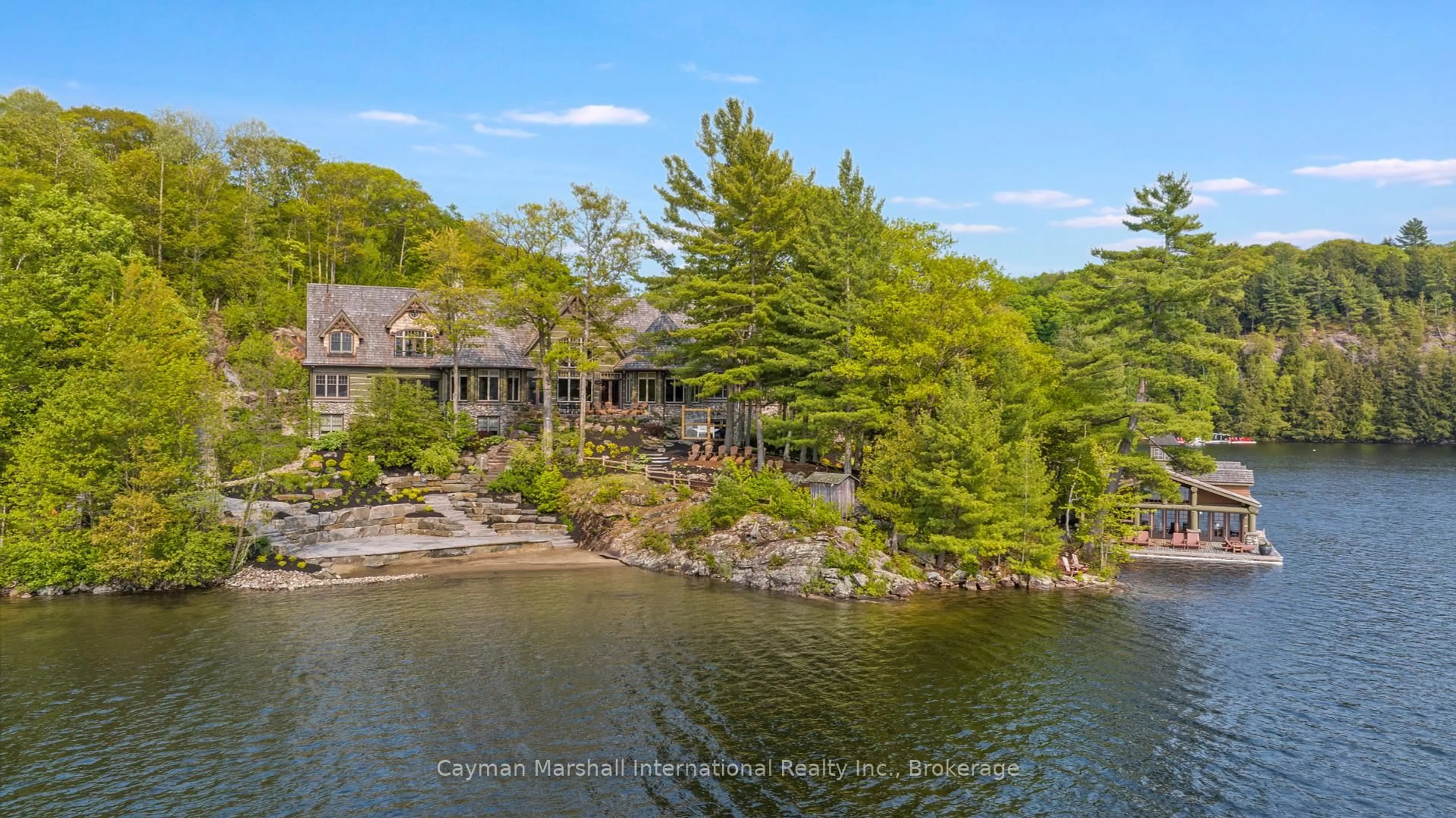 A pic from outside/outdoor area/front of a property/back of a property/a pic from drone, water/lake/river/ocean view for 1100 Delbrooke Rd #2, Lake of Bays Ontario P0A 1H0