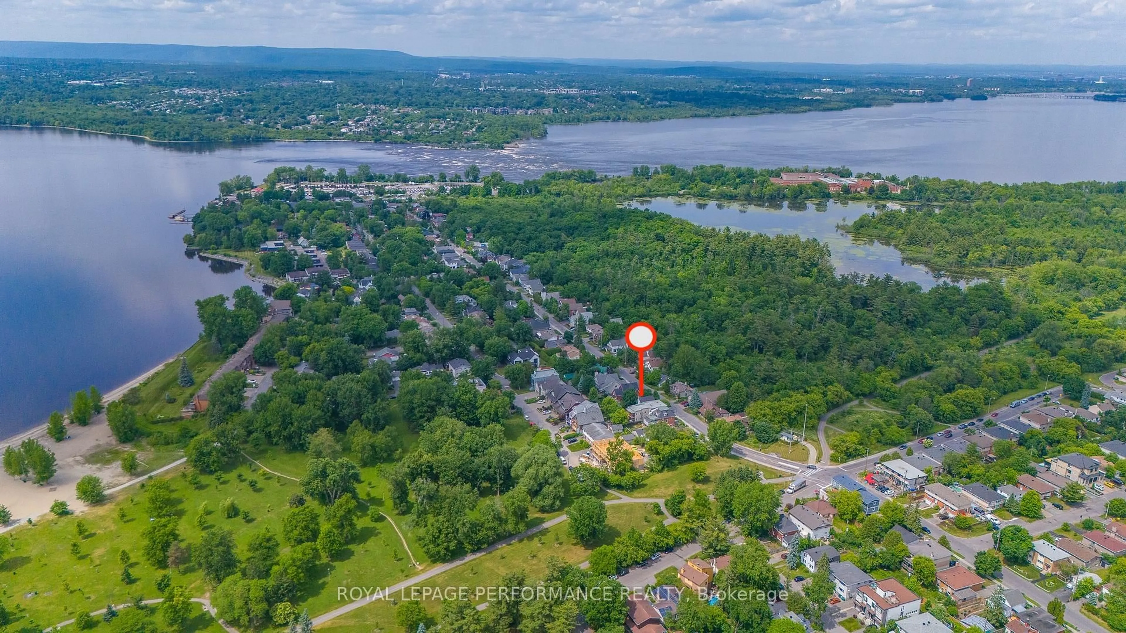 A pic from outside/outdoor area/front of a property/back of a property/a pic from drone, water/lake/river/ocean view for 236 Britannia Rd, Ottawa Ontario K2B 5X2