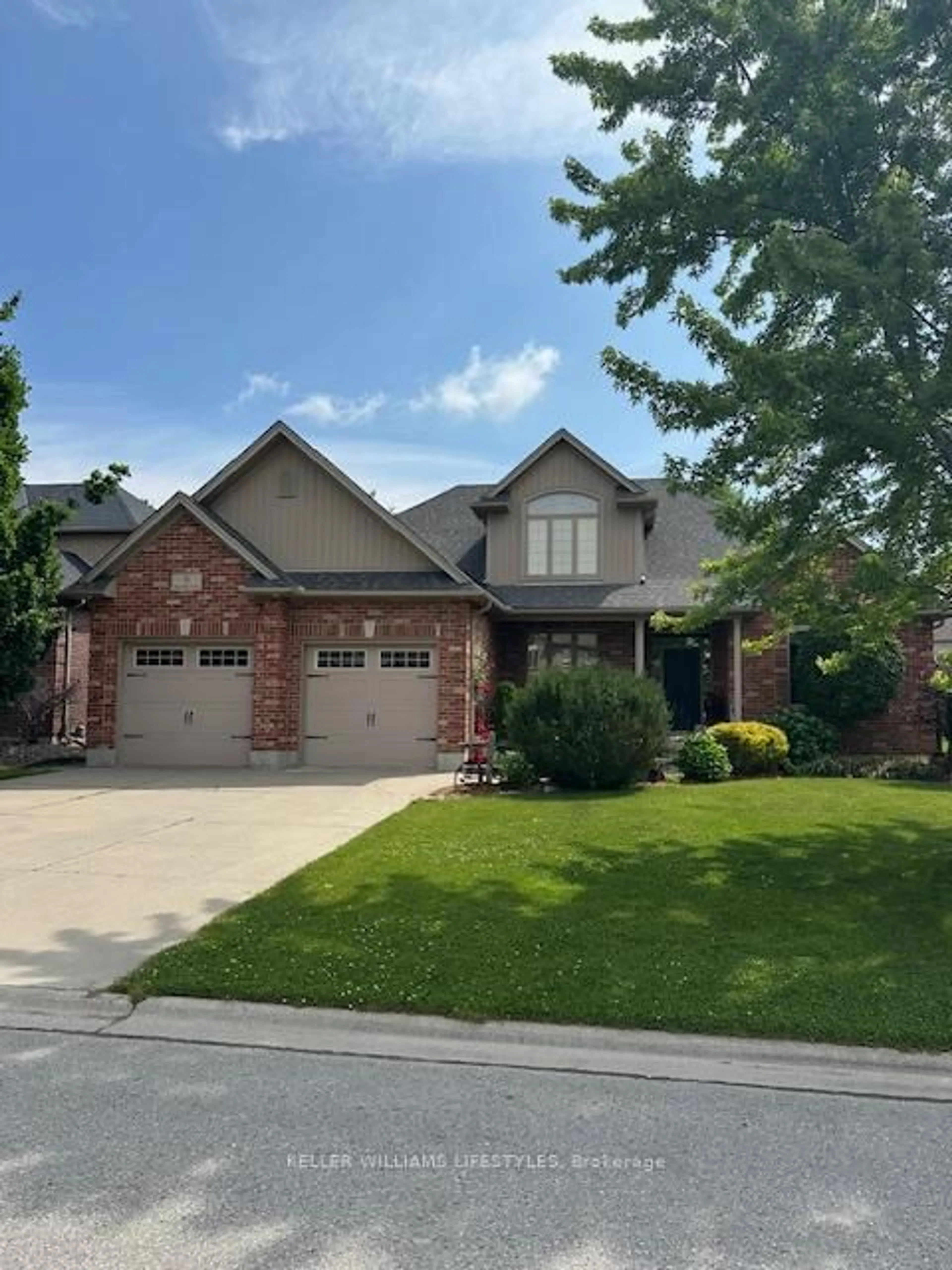 Home with brick exterior material, street for 8 Dogwood Tr, Middlesex Centre Ontario N0M 2A0