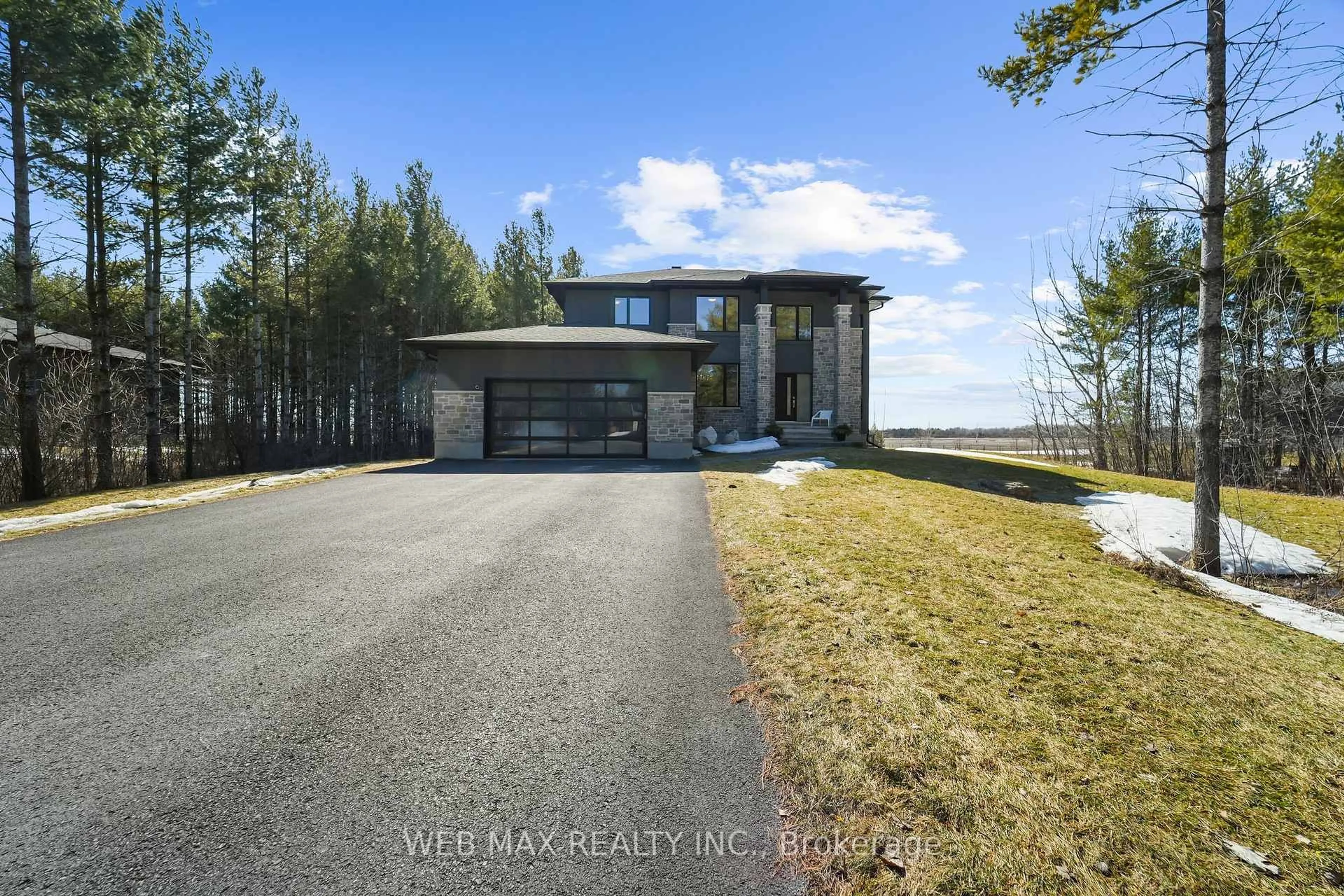 A pic from outside/outdoor area/front of a property/back of a property/a pic from drone, water/lake/river/ocean view for 190 Ridgemont Dr, Ashton Ontario K0A 1B0