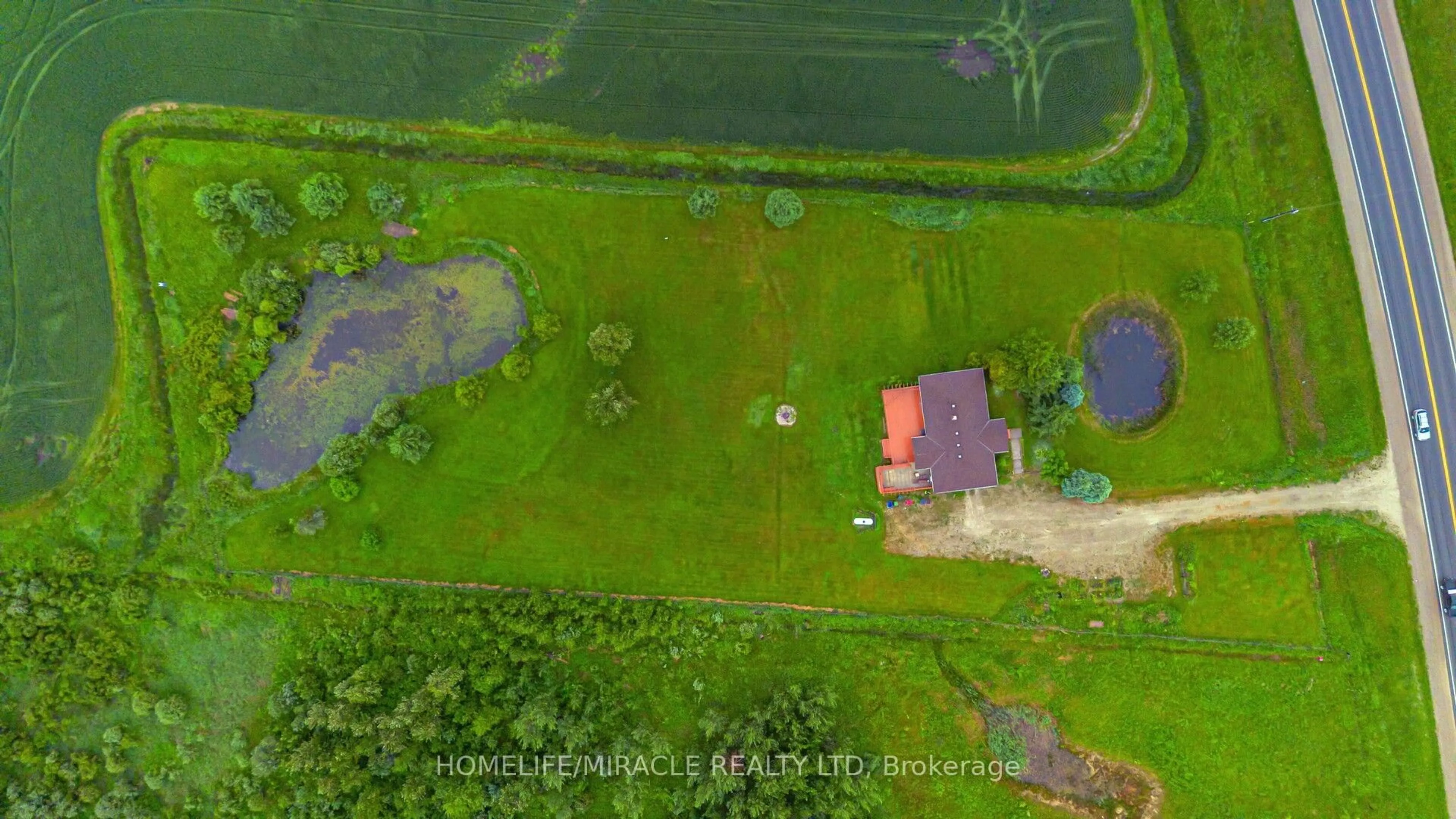 A pic from outside/outdoor area/front of a property/back of a property/a pic from drone, unknown for 773154 Highway 10, Grey Highlands Ontario N0C 1L0