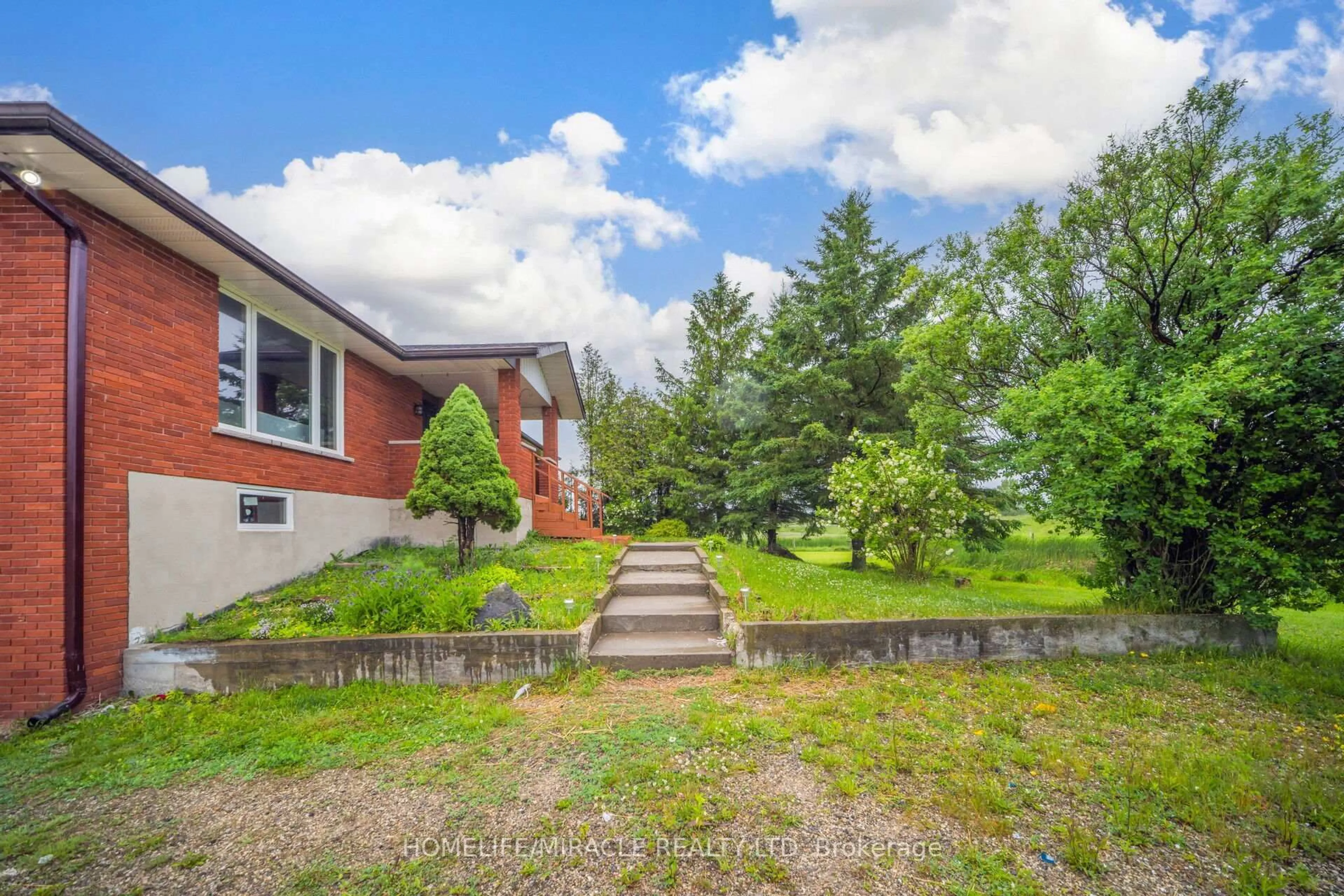 A pic from outside/outdoor area/front of a property/back of a property/a pic from drone, unknown for 773154 Highway 10, Grey Highlands Ontario N0C 1L0