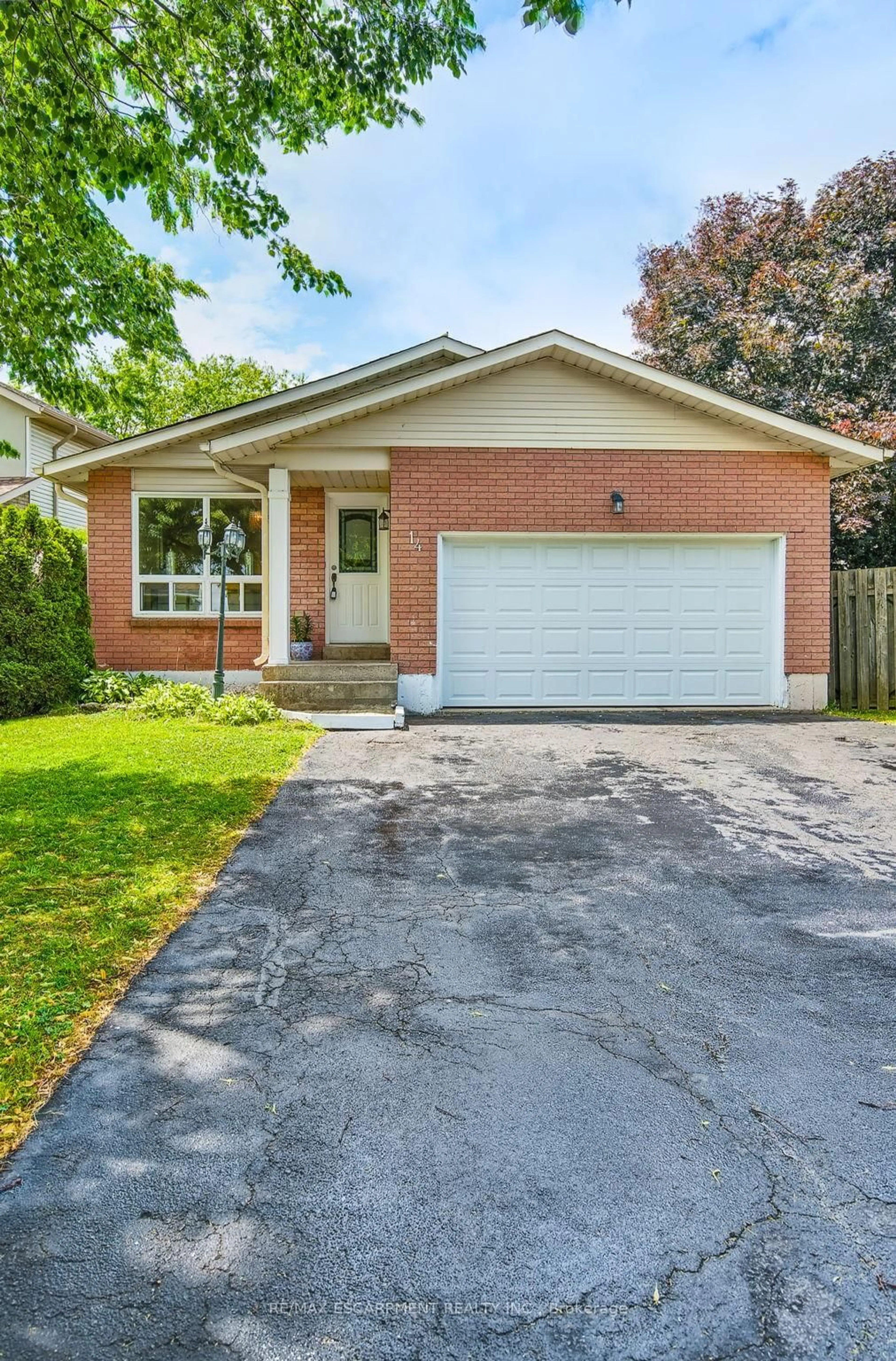 Home with brick exterior material, street for 14 Ashridge Pl, Hamilton Ontario L8W 3S6