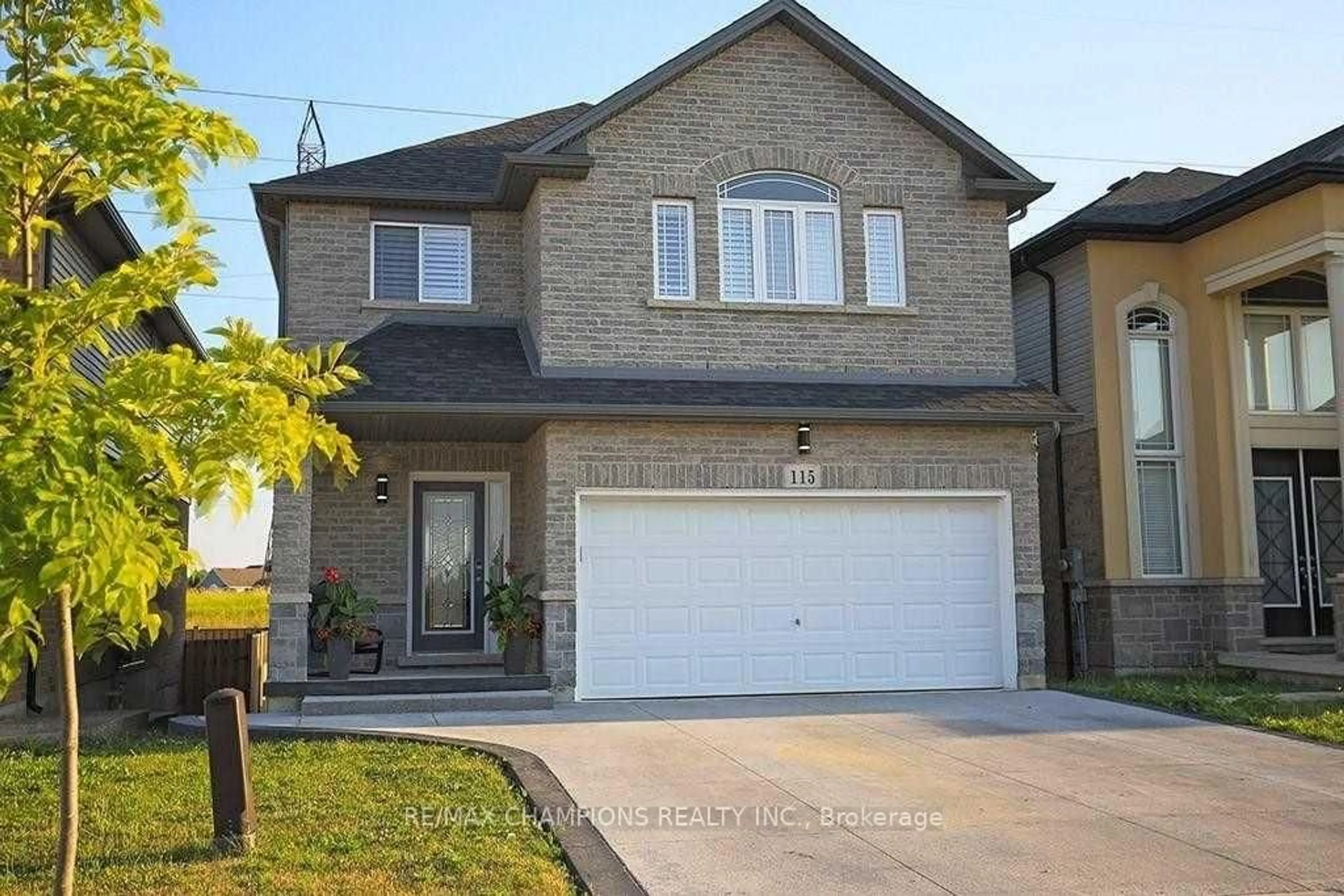 Home with brick exterior material, street for 115 Medici Lane, Hamilton Ontario L9B 0G8