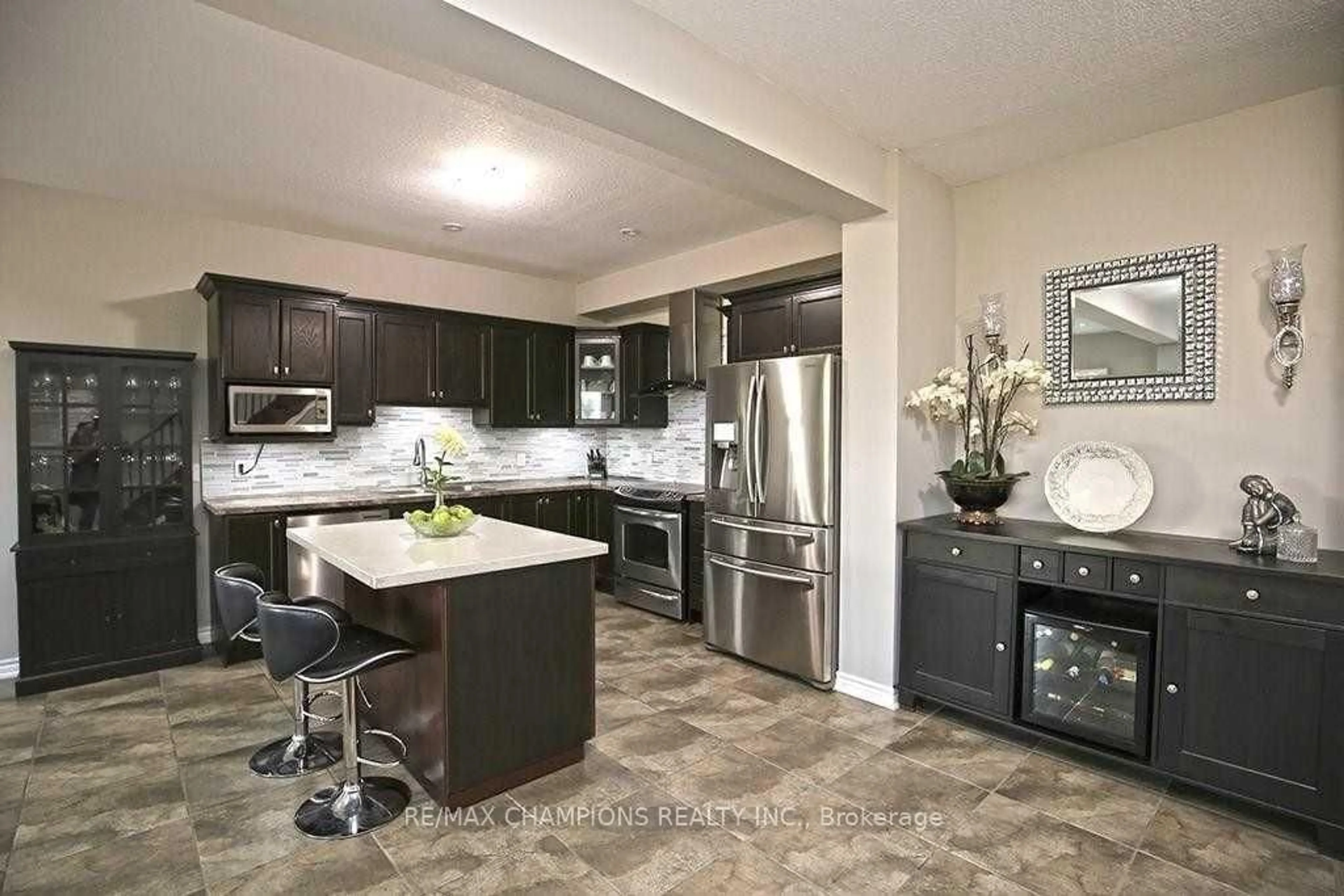 Open concept kitchen, ceramic/tile floor for 115 Medici Lane, Hamilton Ontario L9B 0G8