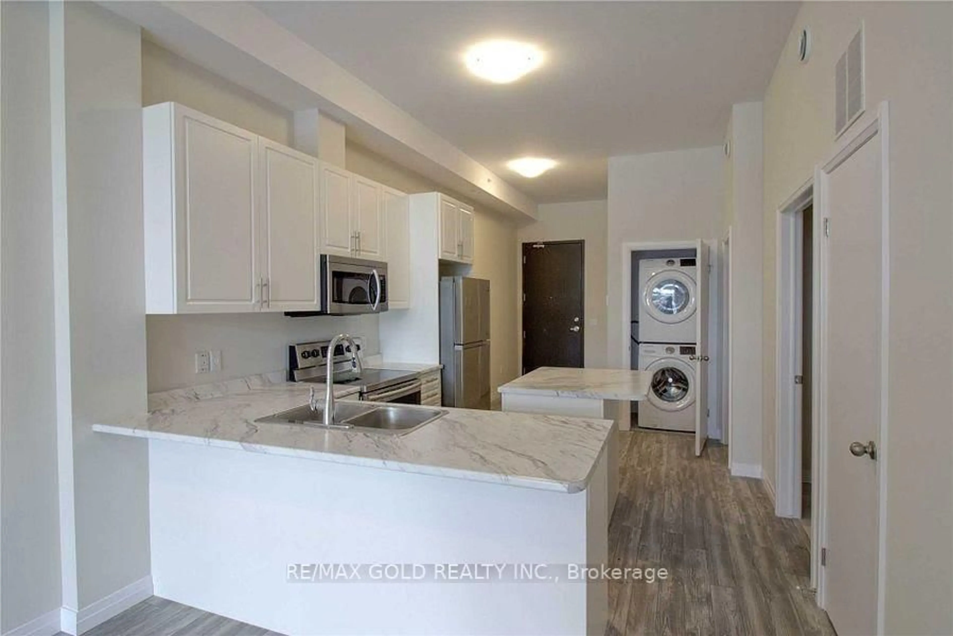 Open concept kitchen, ceramic/tile floor for 85 Morrell St #107B, Brantford Ontario N3T 4J6