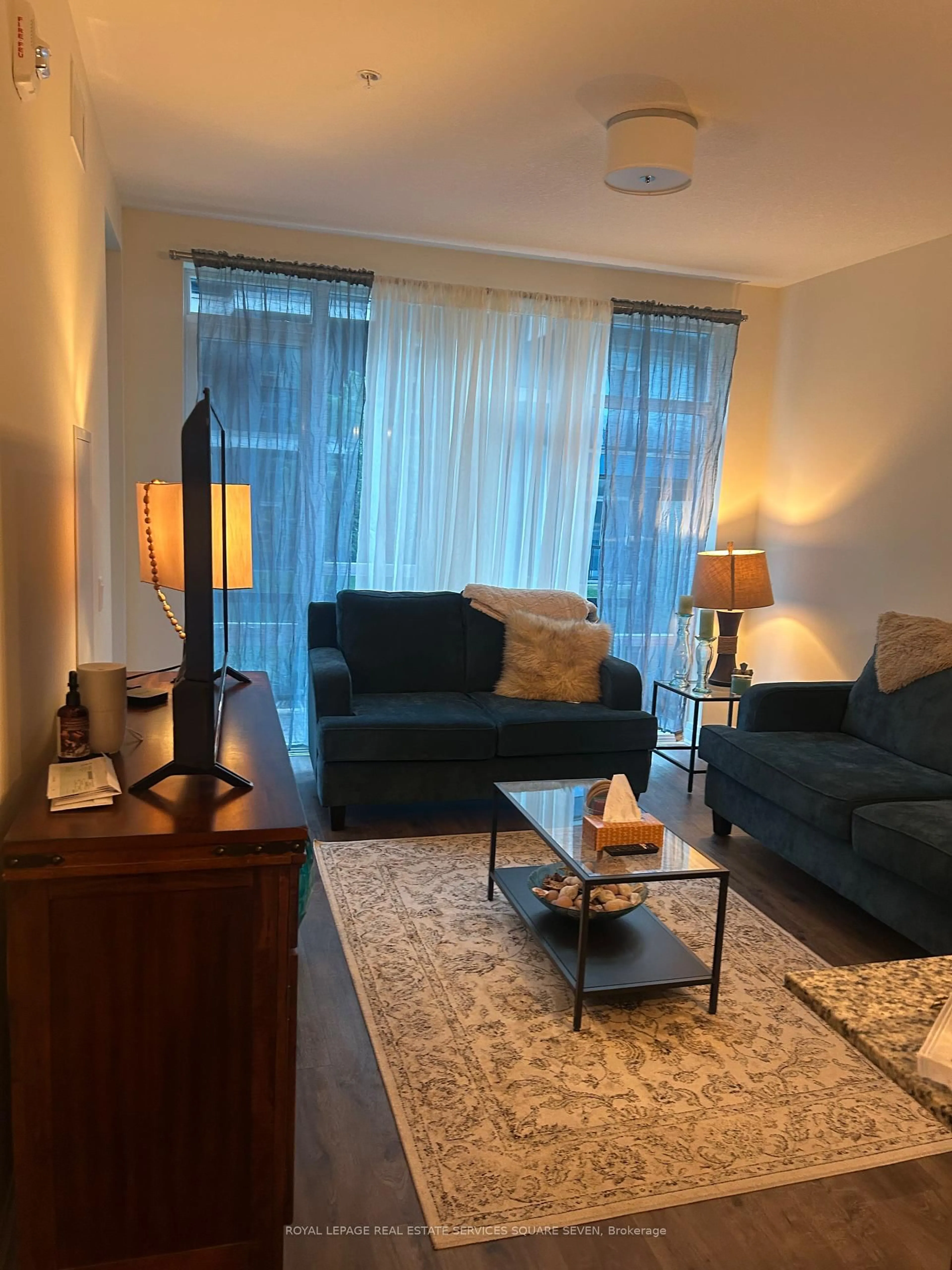 Living room with furniture, unknown for 16 Concord Pl #139, Grimsby Ontario L3M 0J1