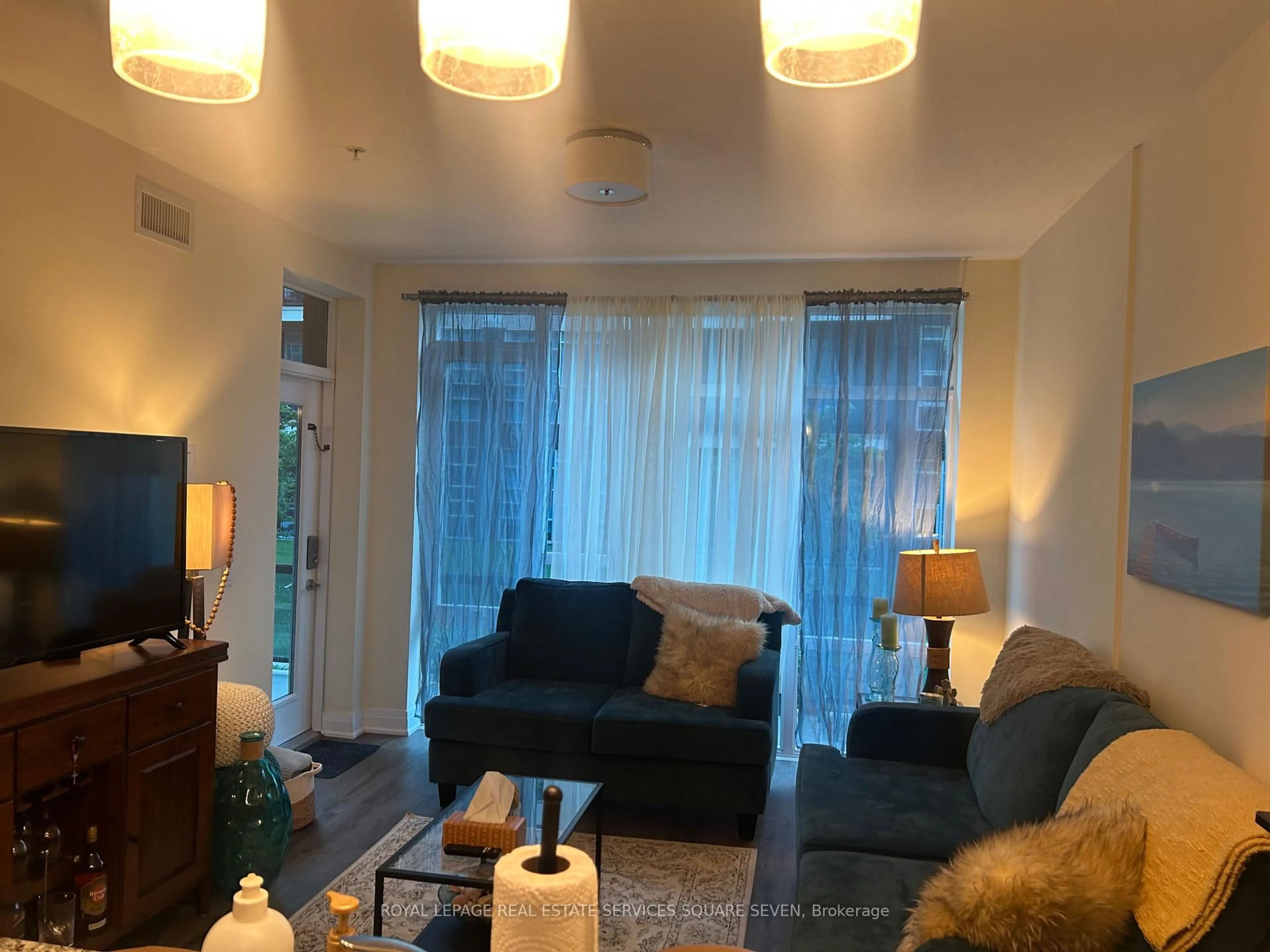 Living room with furniture, unknown for 16 Concord Pl #139, Grimsby Ontario L3M 0J1