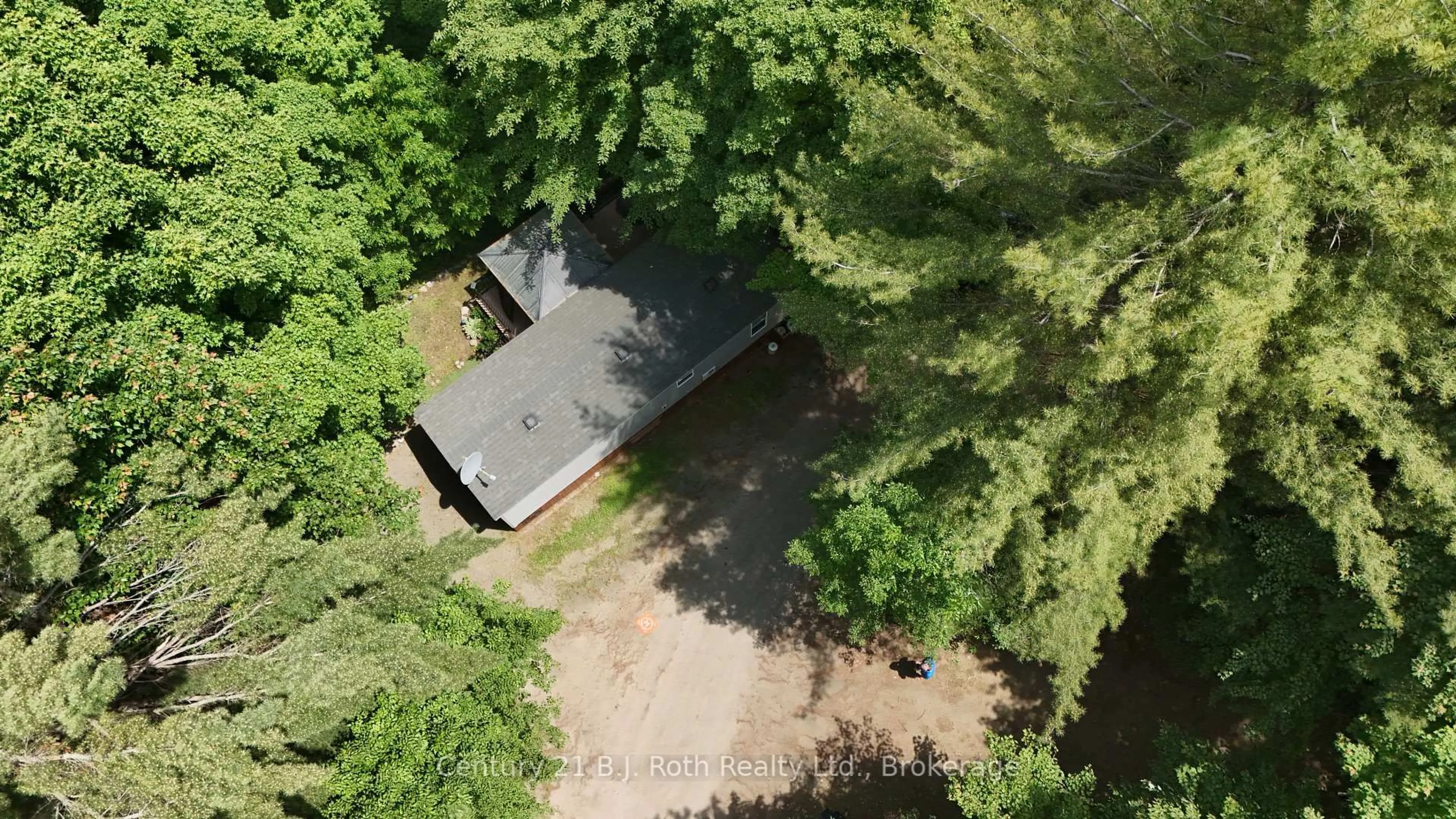 A pic from outside/outdoor area/front of a property/back of a property/a pic from drone, forest/trees view for 767 Poplar Cres, Bracebridge Ontario P1L 1W9