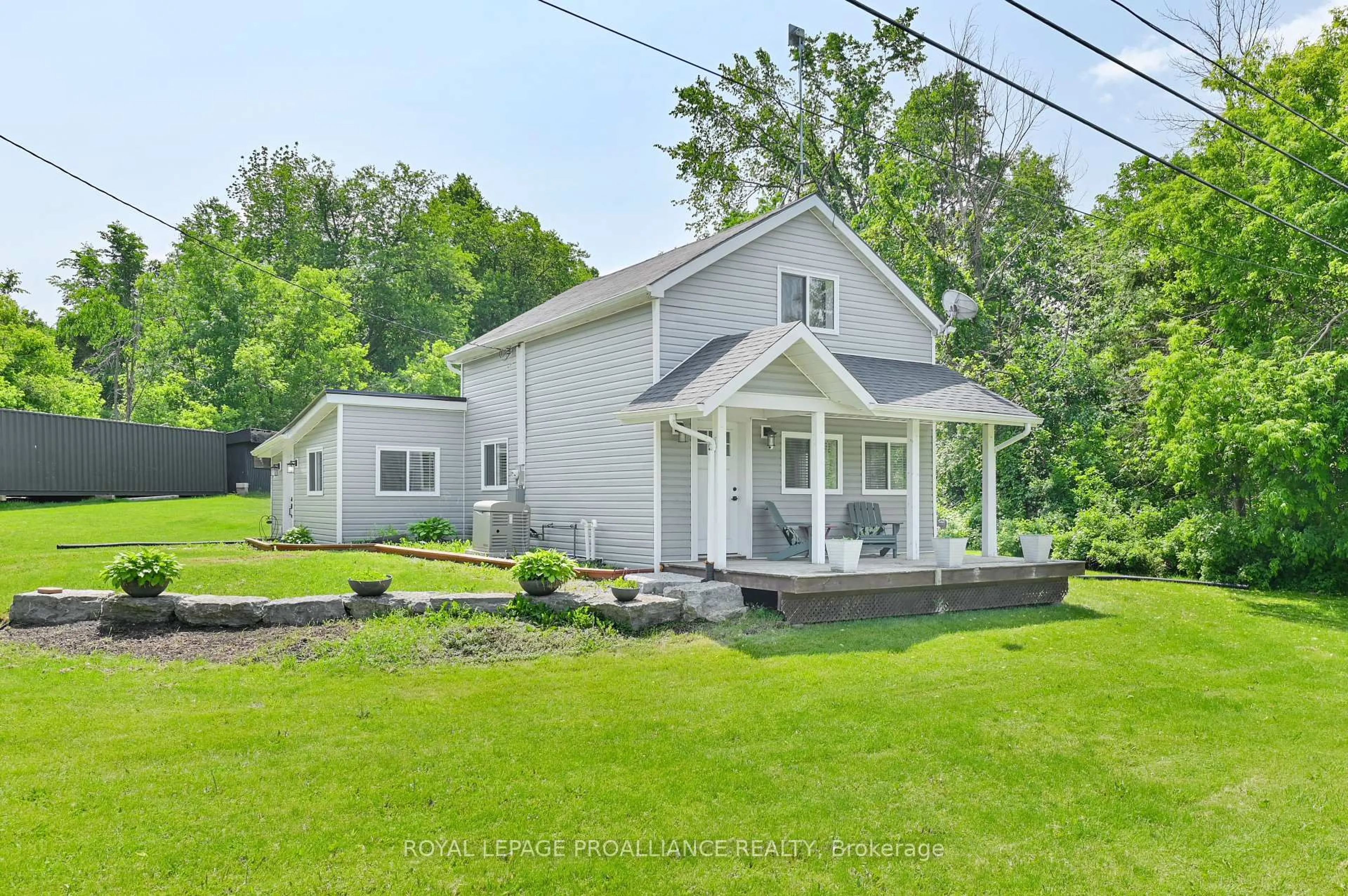 A pic from outside/outdoor area/front of a property/back of a property/a pic from drone, street for 11100 Highway 62, Madoc Ontario K0K 2K0