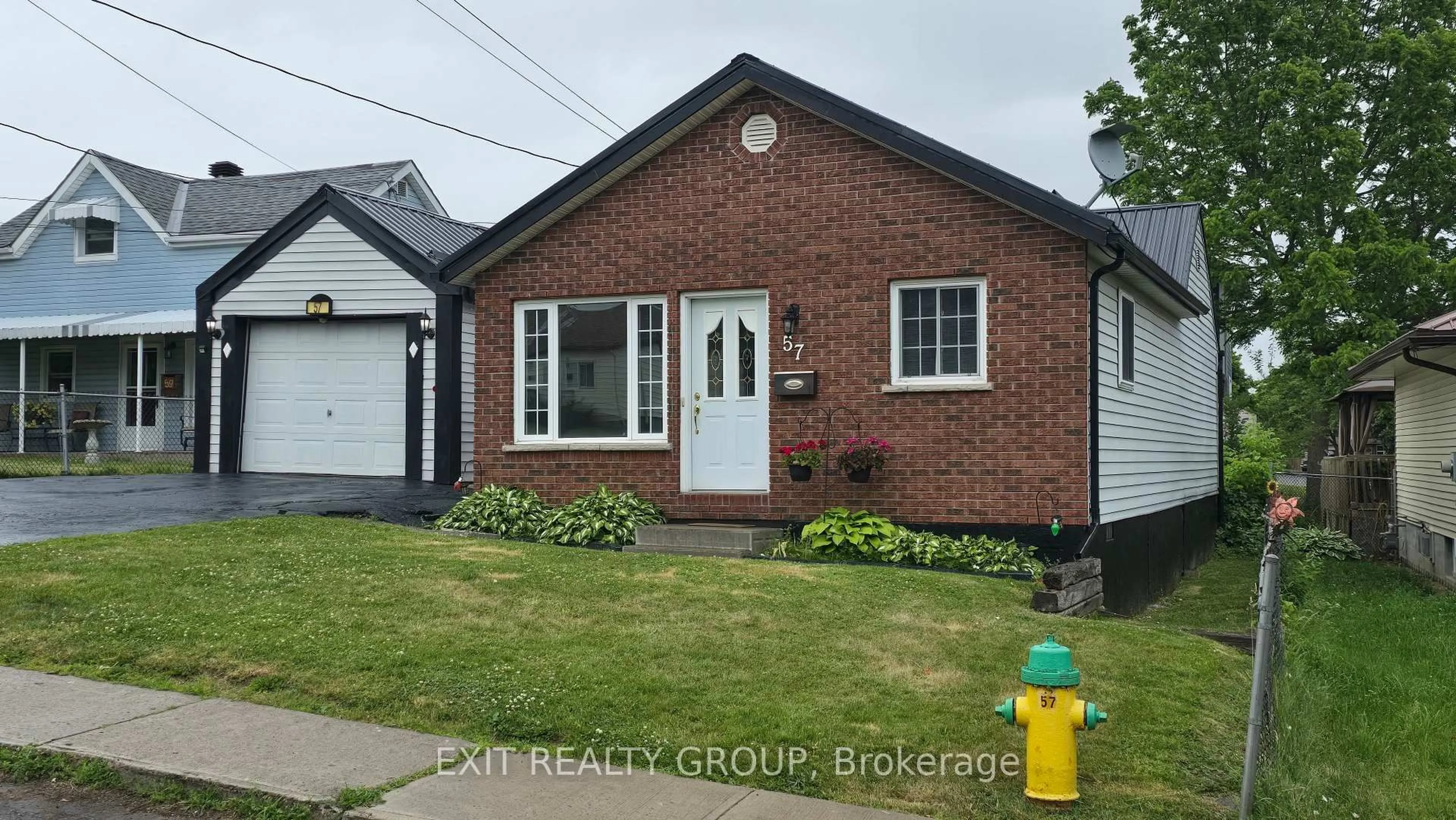 Home with brick exterior material, street for 57 Prince of Wales Dr, Belleville Ontario K8P 2T6