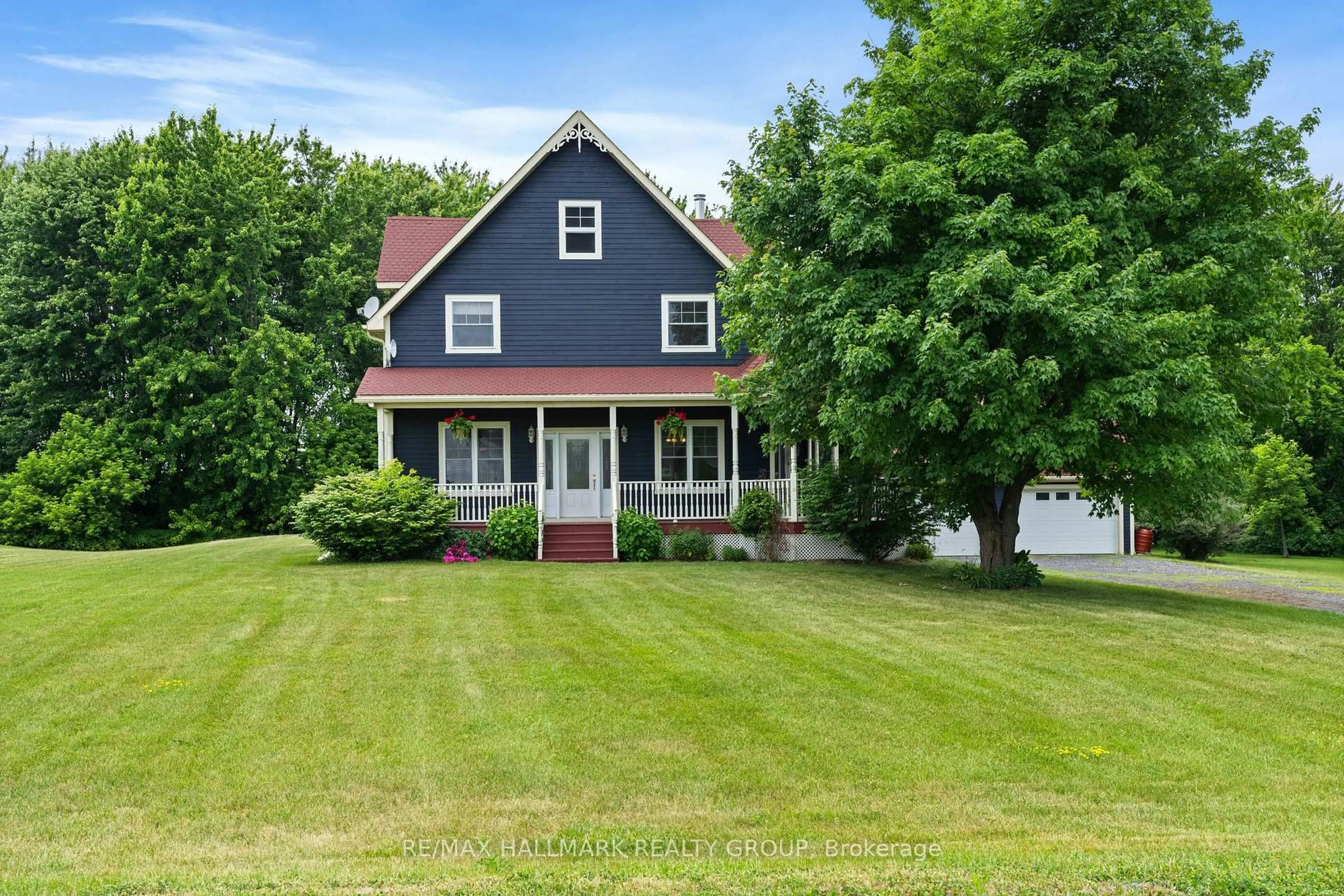 A pic from outside/outdoor area/front of a property/back of a property/a pic from drone, street for 21479 Maccuaig Dr, South Glengarry Ontario K0C 1E0
