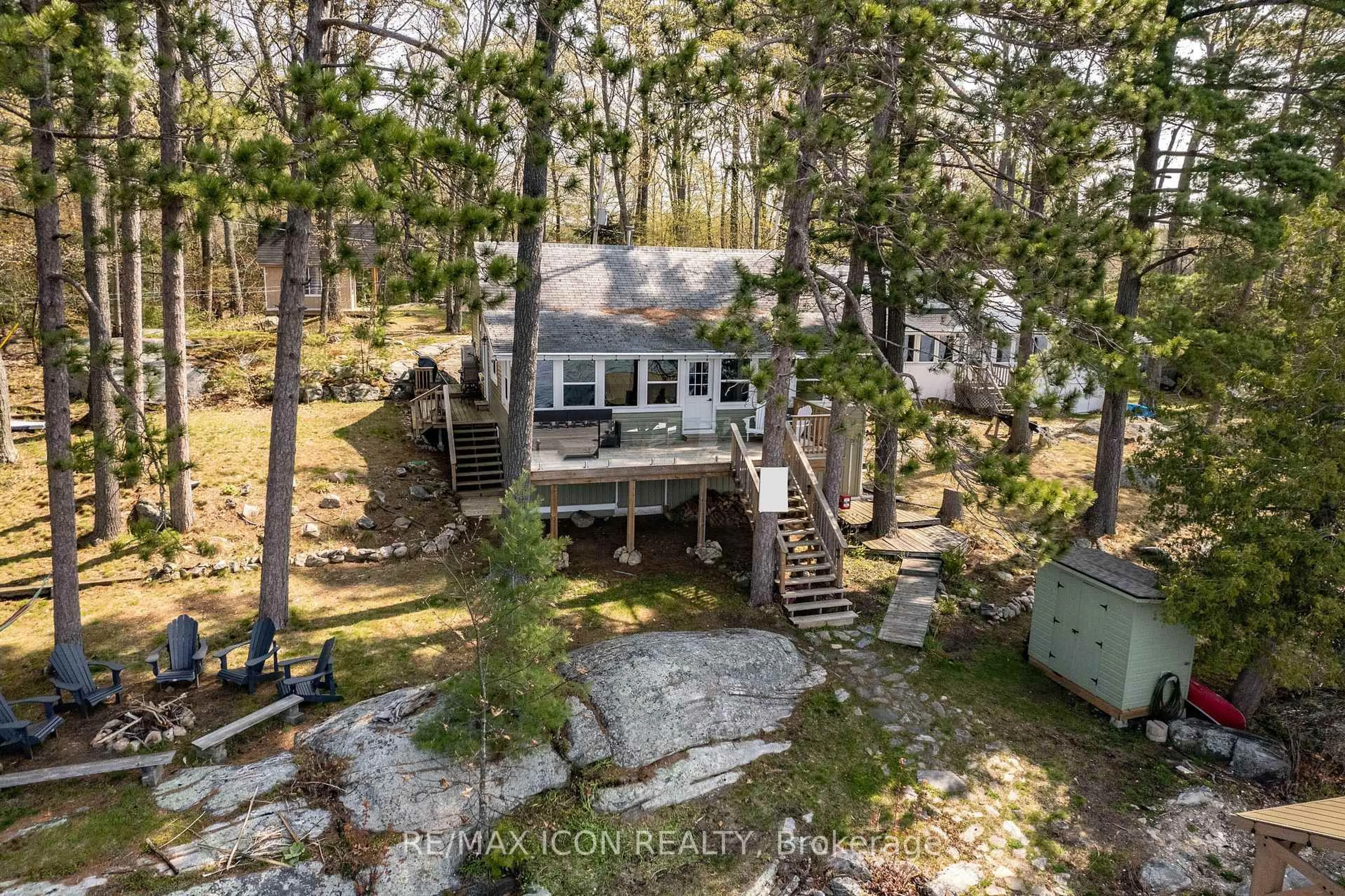 A pic from outside/outdoor area/front of a property/back of a property/a pic from drone, water/lake/river/ocean view for 99 Bala Park Island, Muskoka Lakes Ontario P0C 1A0