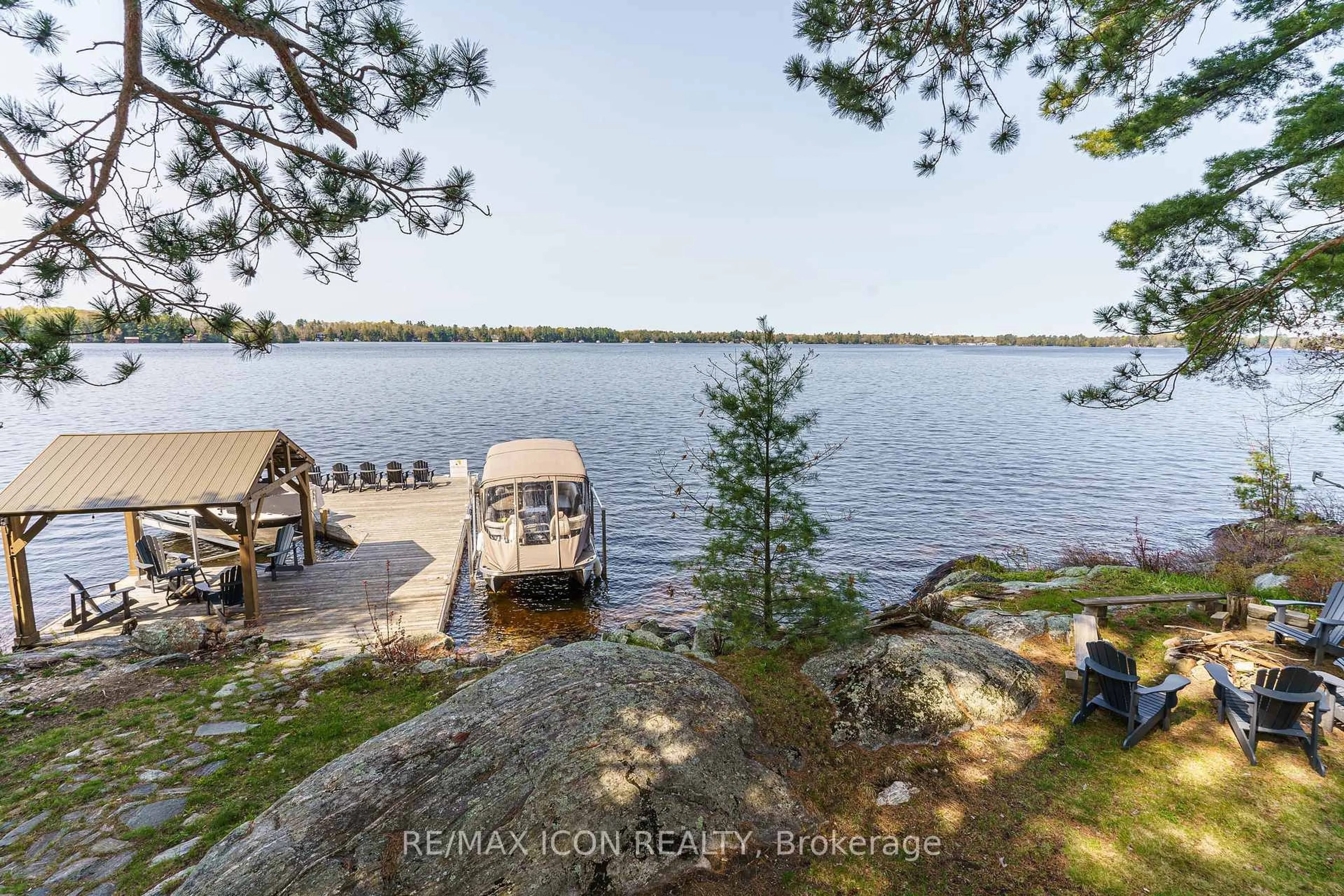 A pic from outside/outdoor area/front of a property/back of a property/a pic from drone, water/lake/river/ocean view for 99 Bala Park Island, Muskoka Lakes Ontario P0C 1A0