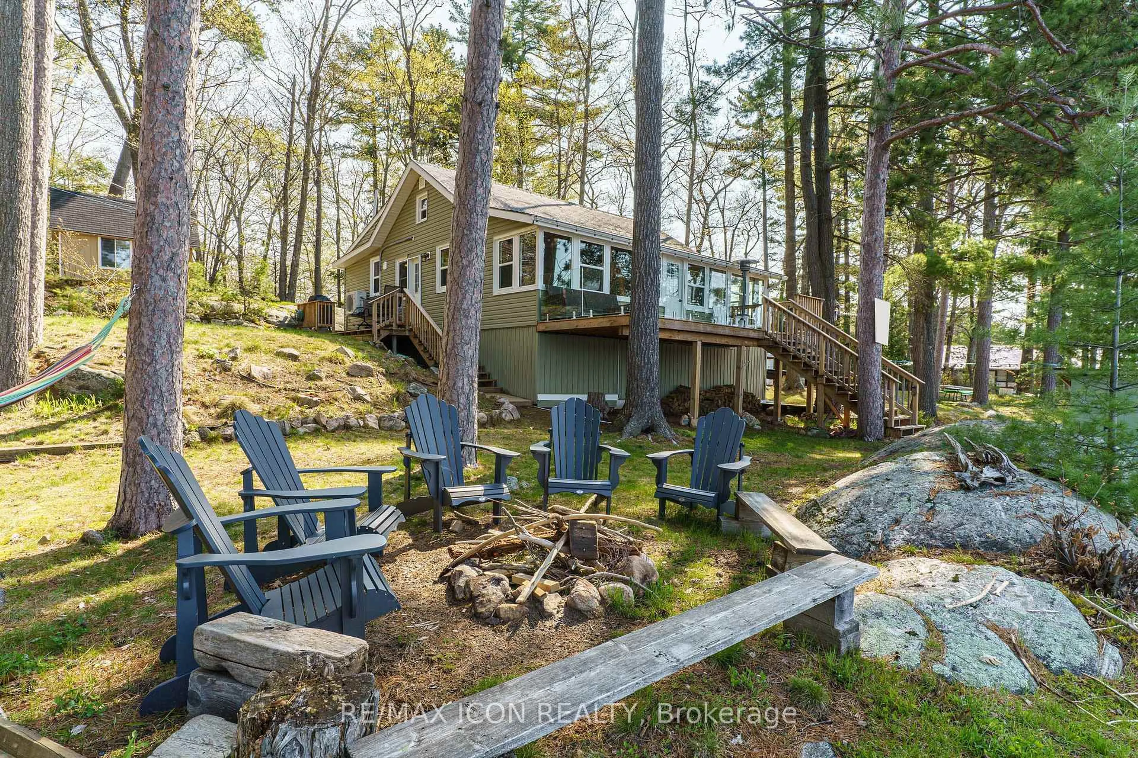 A pic from outside/outdoor area/front of a property/back of a property/a pic from drone, water/lake/river/ocean view for 99 Bala Park Island, Muskoka Lakes Ontario P0C 1A0