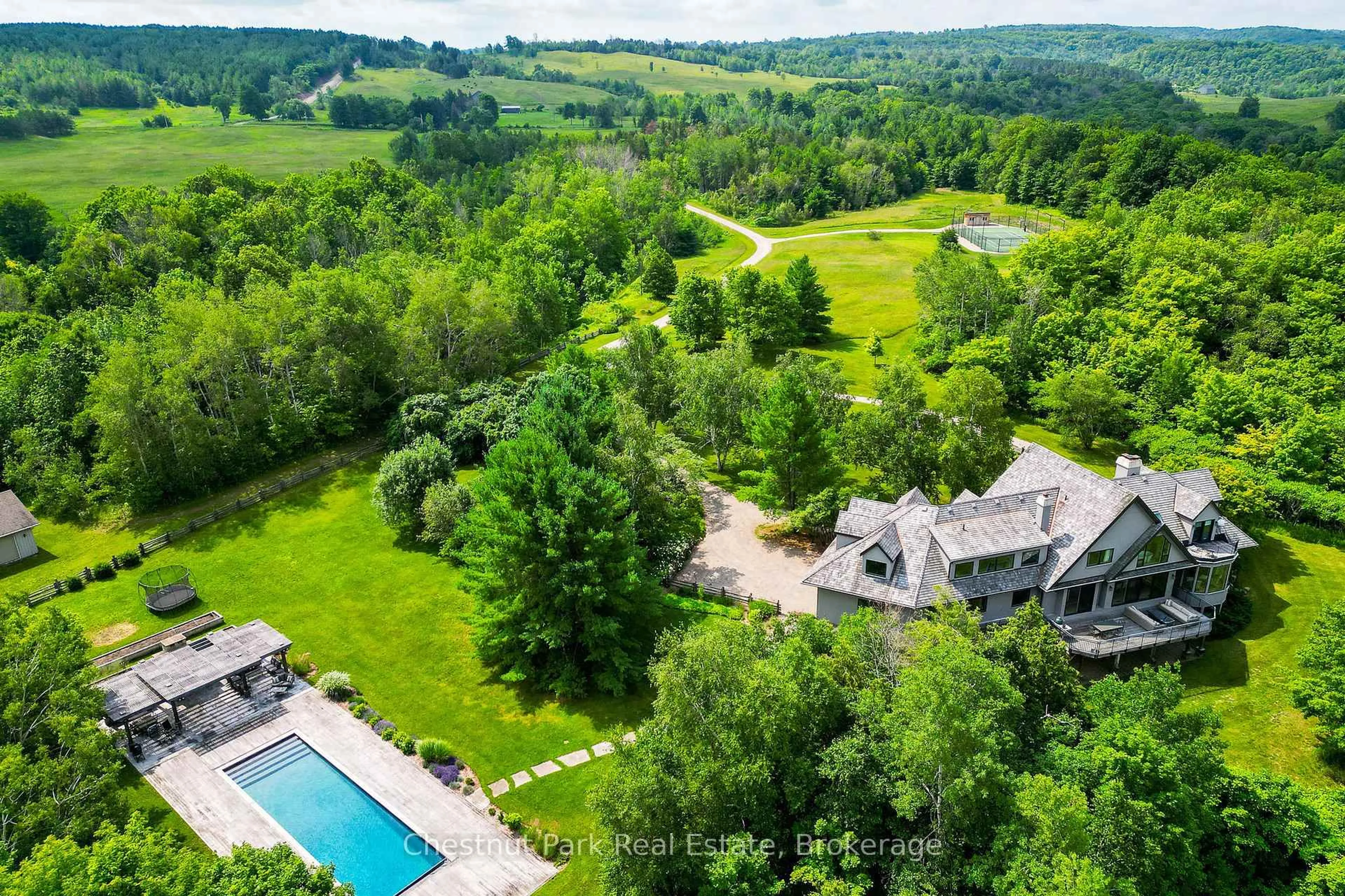 A pic from outside/outdoor area/front of a property/back of a property/a pic from drone, water/lake/river/ocean view for 717380 1st Line, Mulmur Ontario L9V 0G2