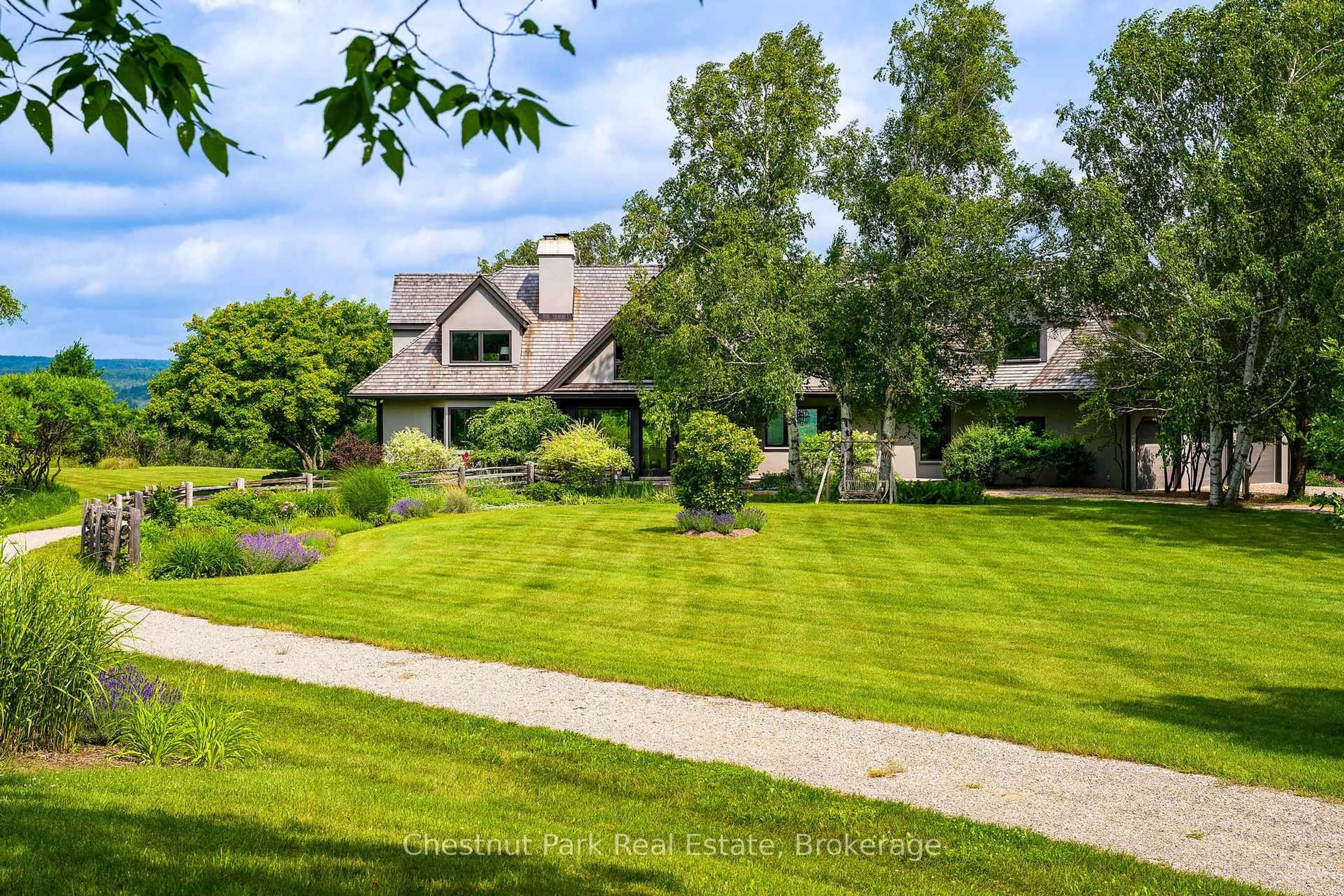 A pic from outside/outdoor area/front of a property/back of a property/a pic from drone, street for 717380 1st Line, Mulmur Ontario L9V 0G2