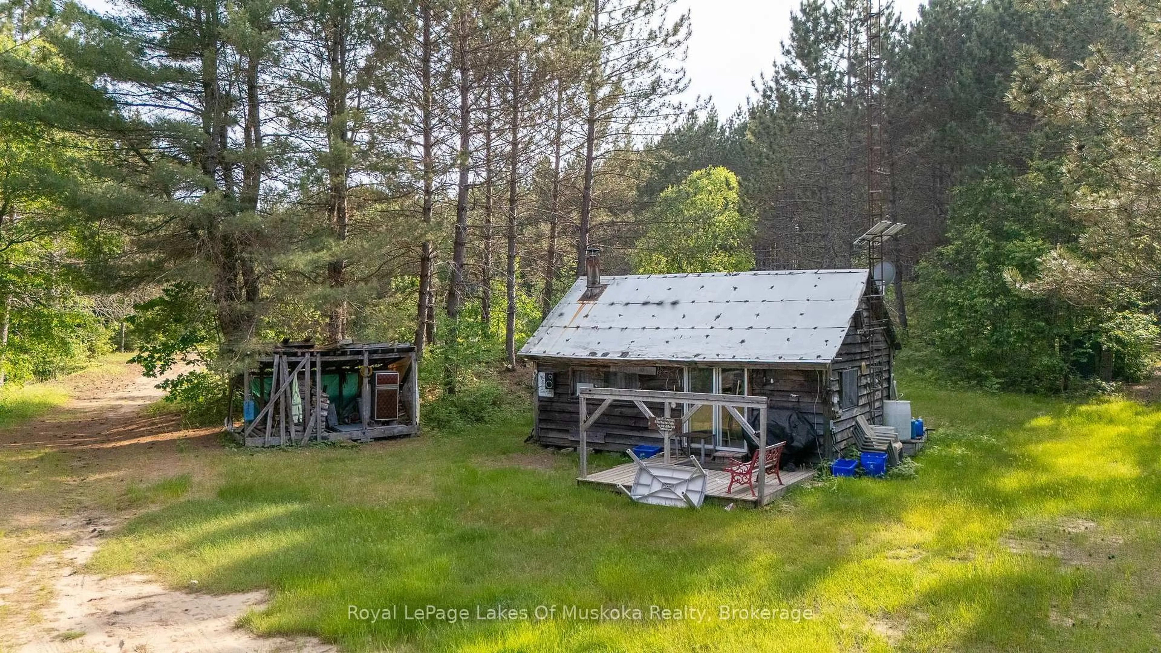 A pic from outside/outdoor area/front of a property/back of a property/a pic from drone, forest/trees view for 1958 518 Highway, McMurrich/Monteith Ontario P0A 1Y0
