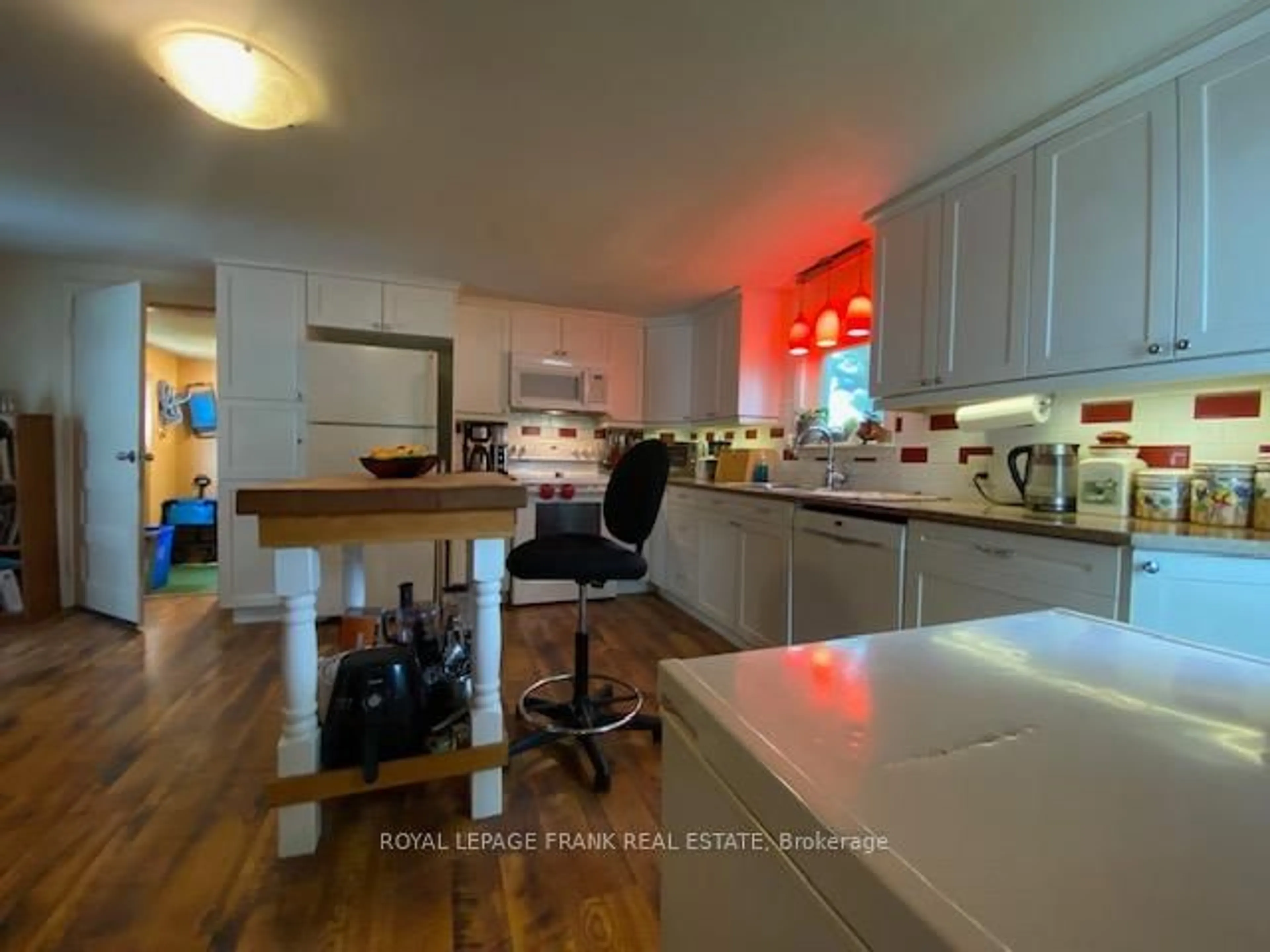 Open concept kitchen, wood/laminate floor for 174 King St, Cramahe Ontario K0K 1S0
