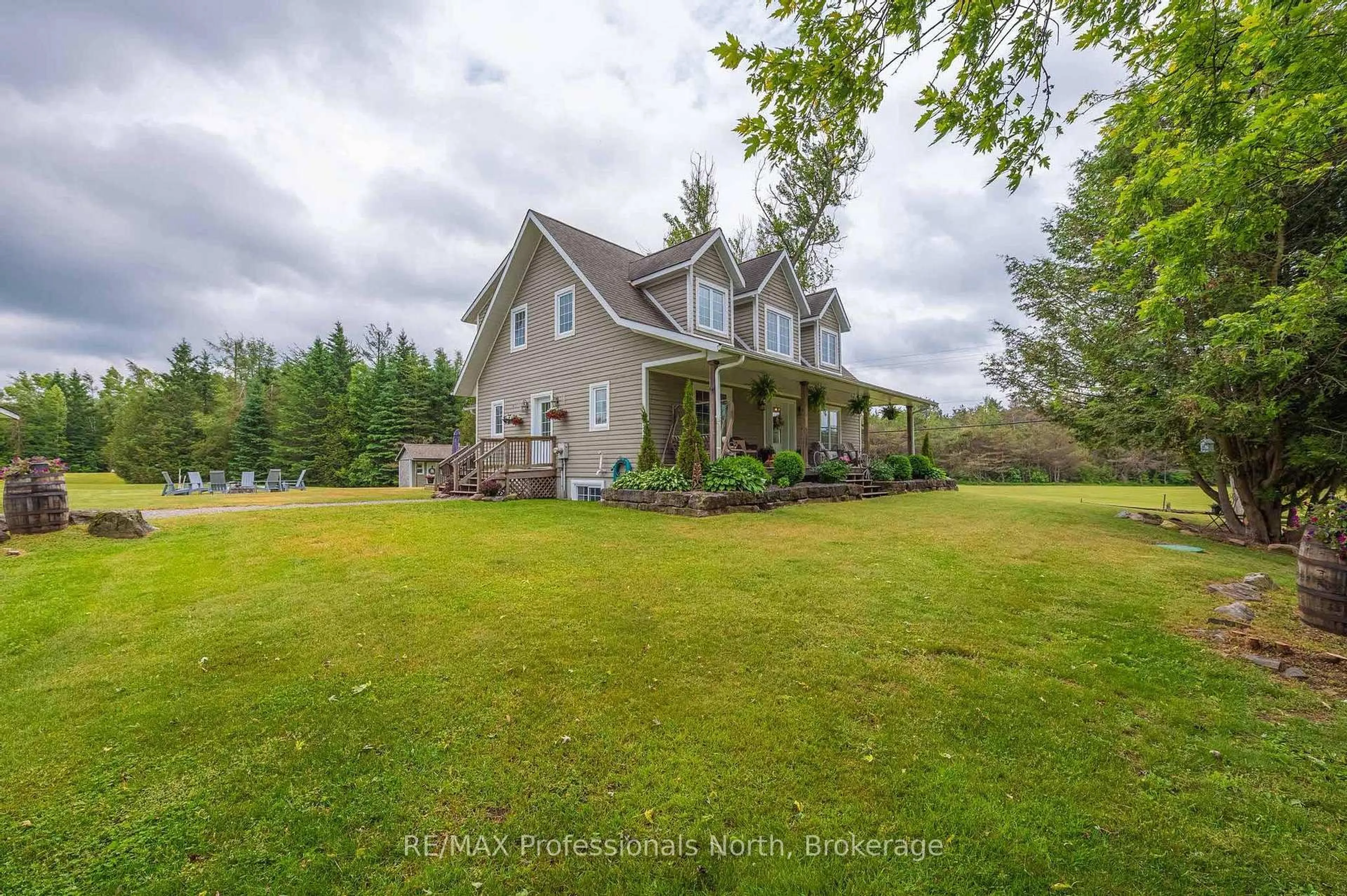 A pic from outside/outdoor area/front of a property/back of a property/a pic from drone, water/lake/river/ocean view for 3580 County Road 121, North Kawartha Ontario K0M 2A0