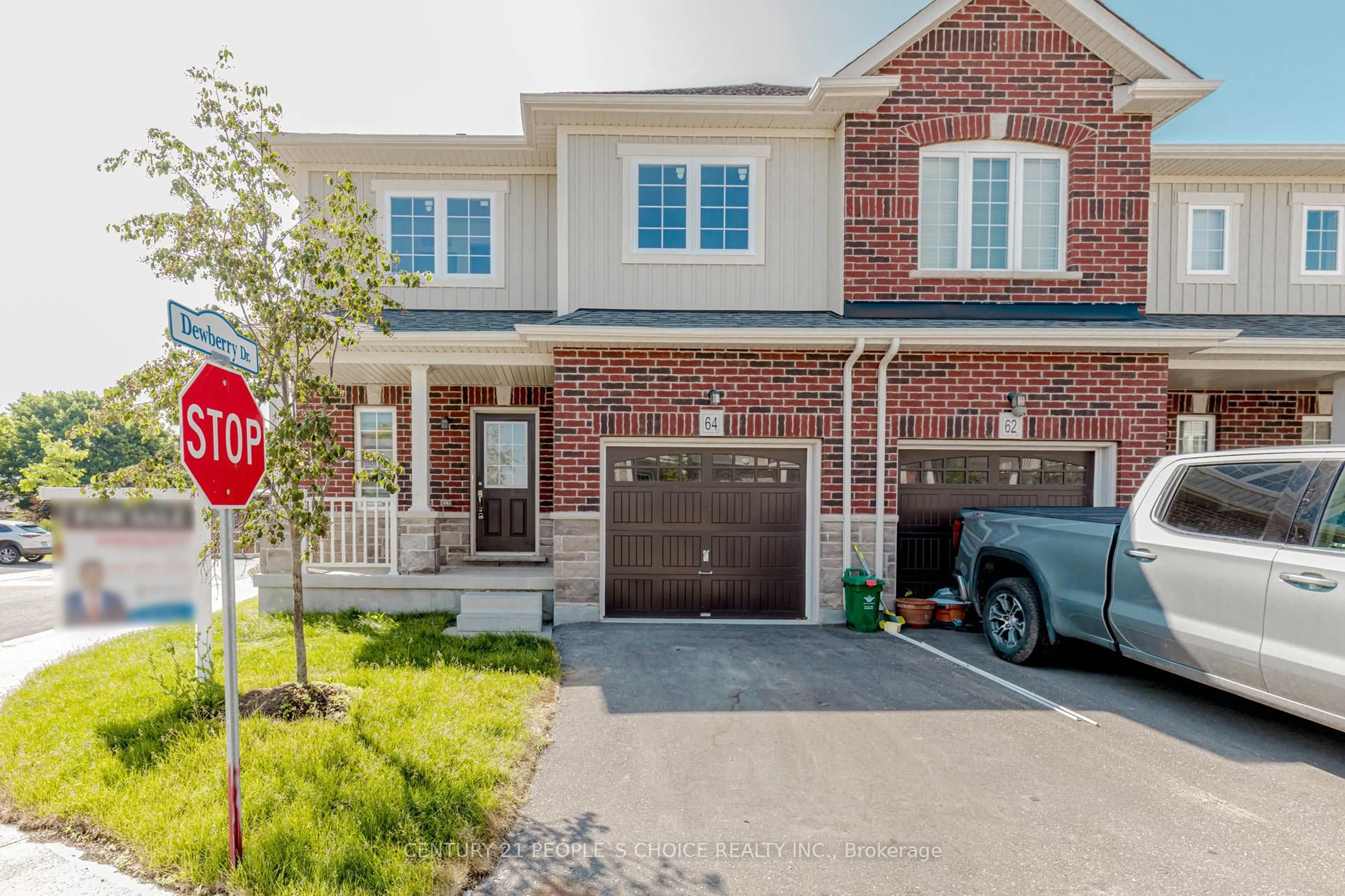 Home with brick exterior material, street for 64 Dewberry Dr, Kitchener Ontario N2B 0A9