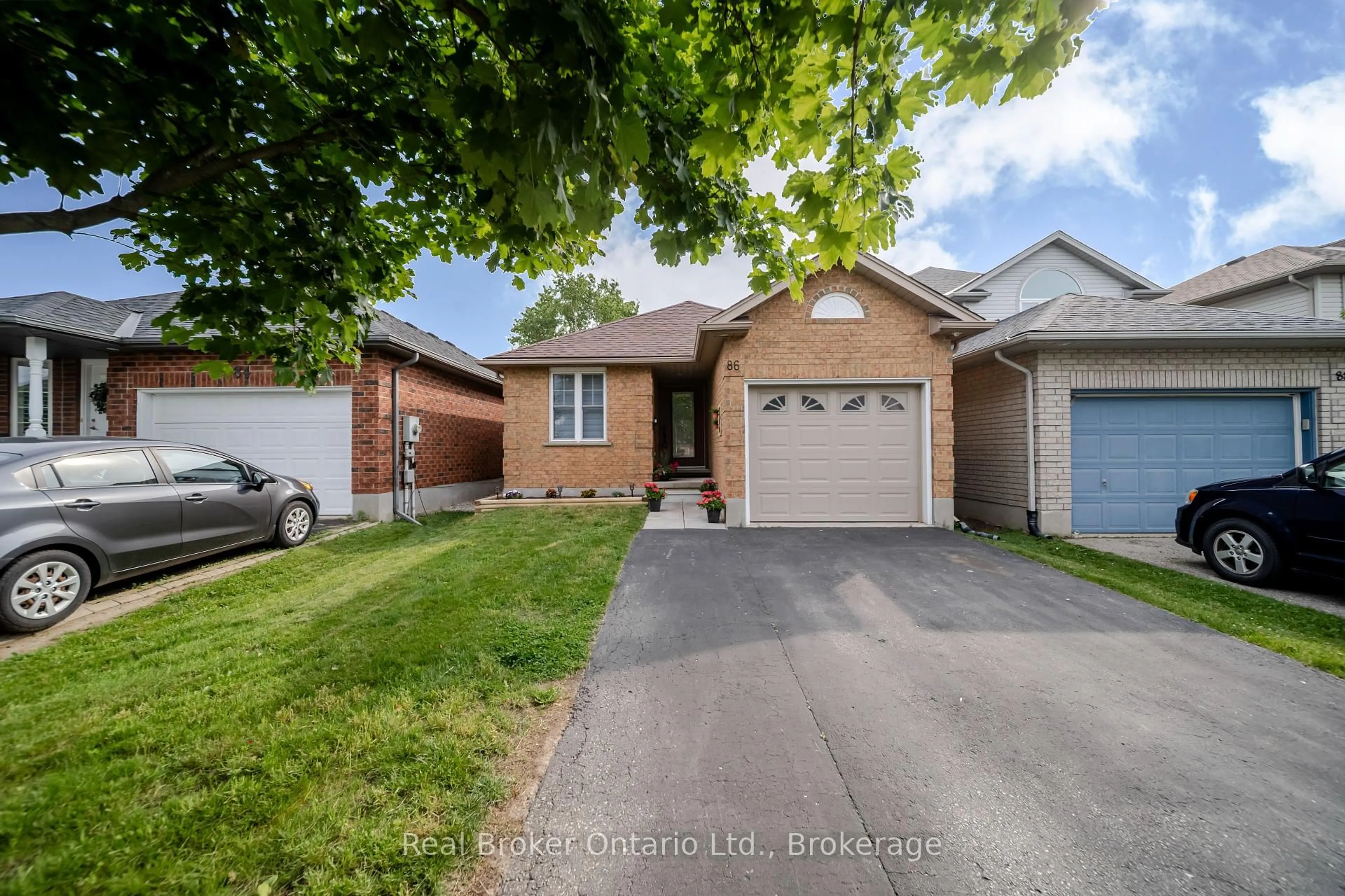Home with brick exterior material, street for 86 Milson Cres, Guelph Ontario N1C 1G6