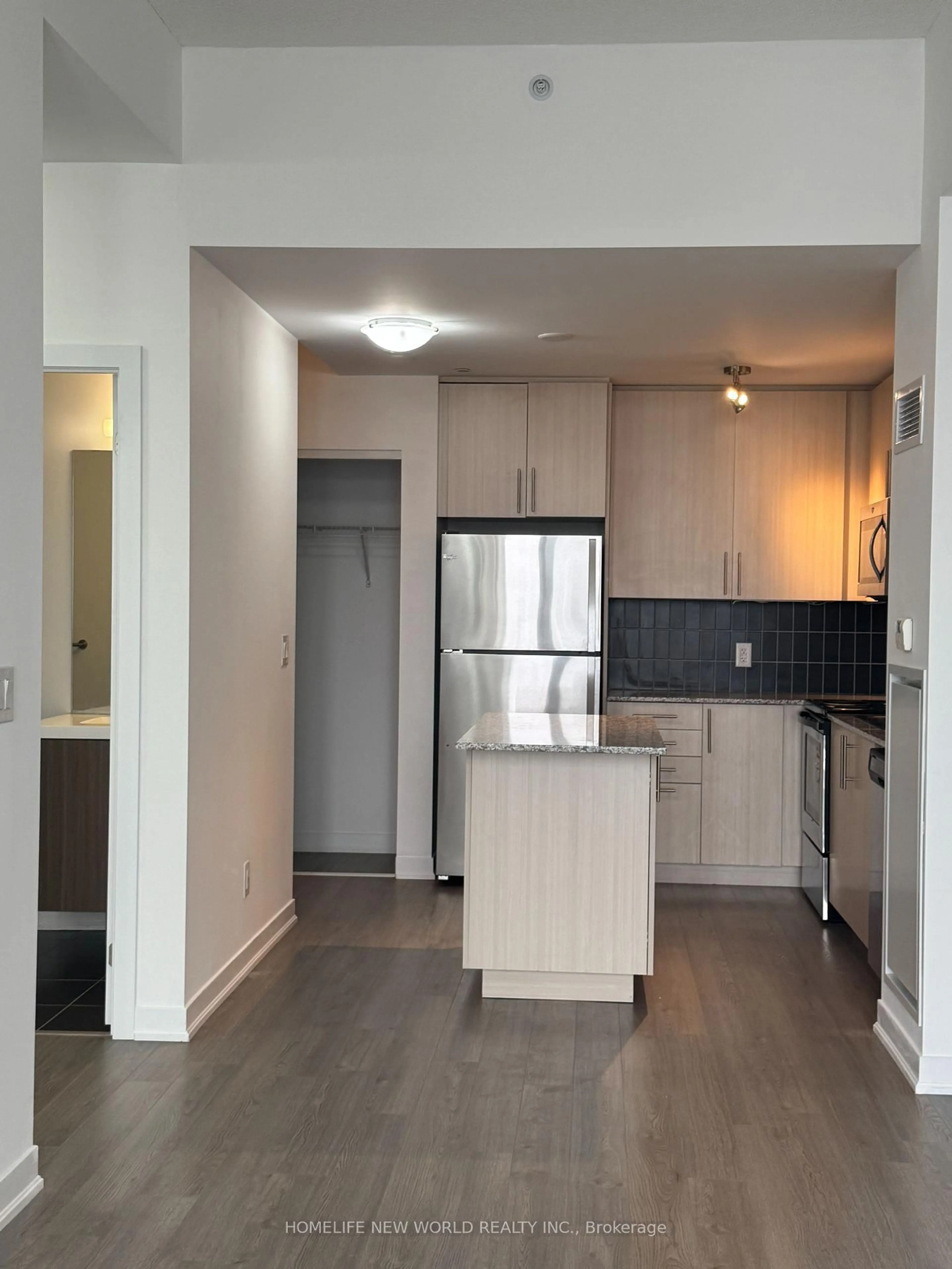 Open concept kitchen, wood/laminate floor for 85 Duke St #201, Kitchener Ontario N2H 0B7