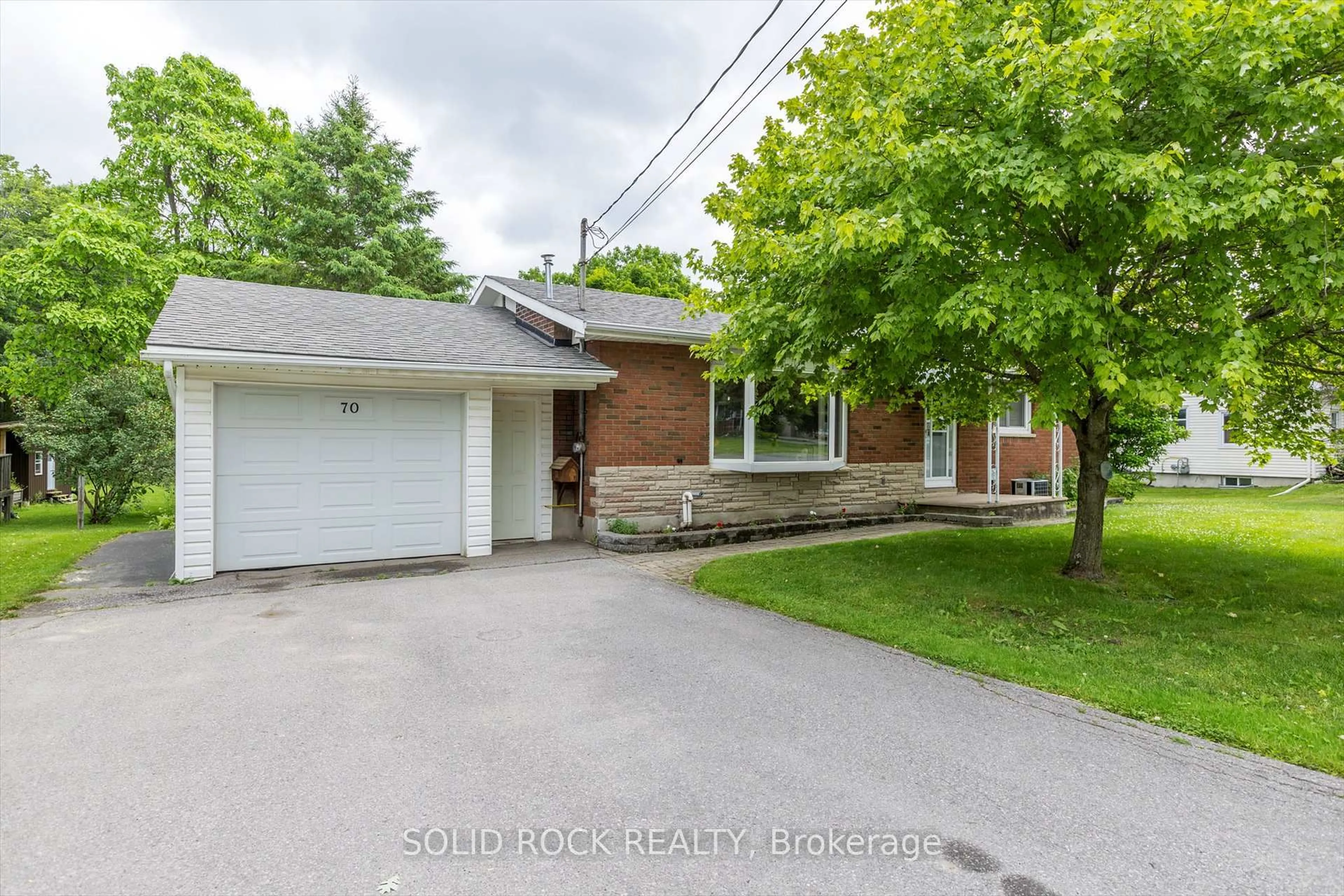 Home with brick exterior material, street for 70 Bursthall St, Limoges Ontario K0K 2M0