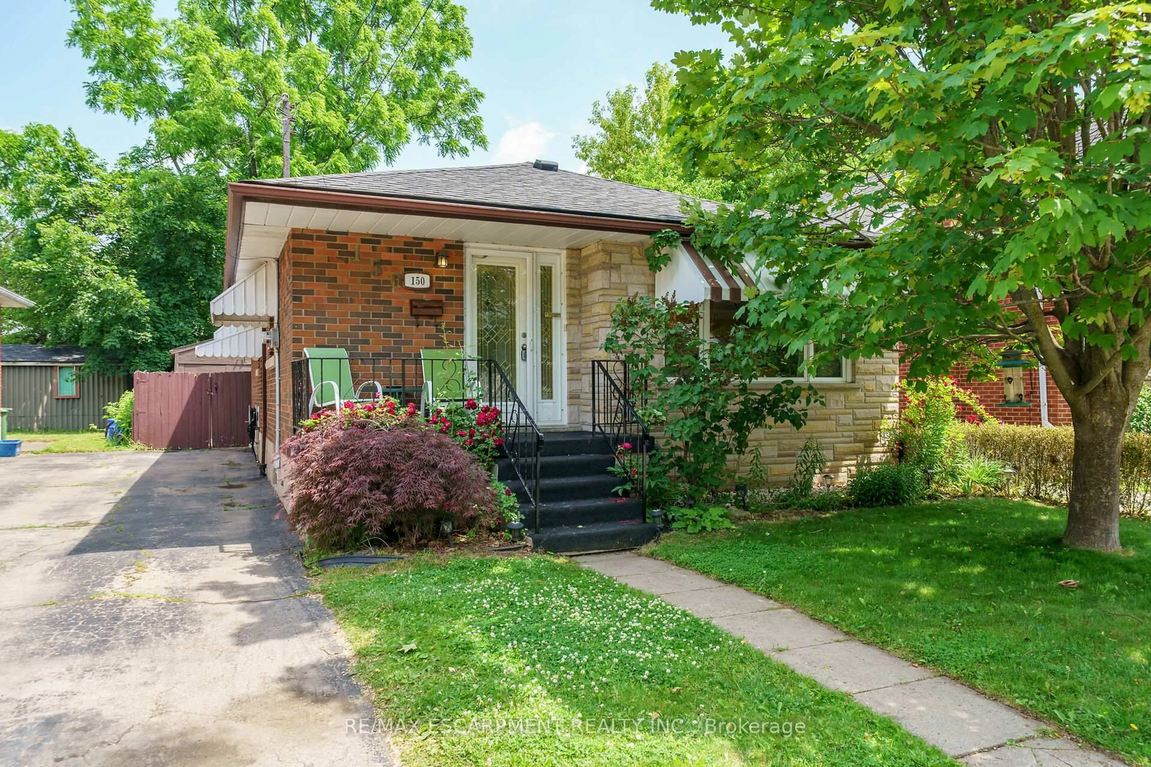 Home with brick exterior material, street for 150 Whitney Ave, Hamilton Ontario L8S 2G7