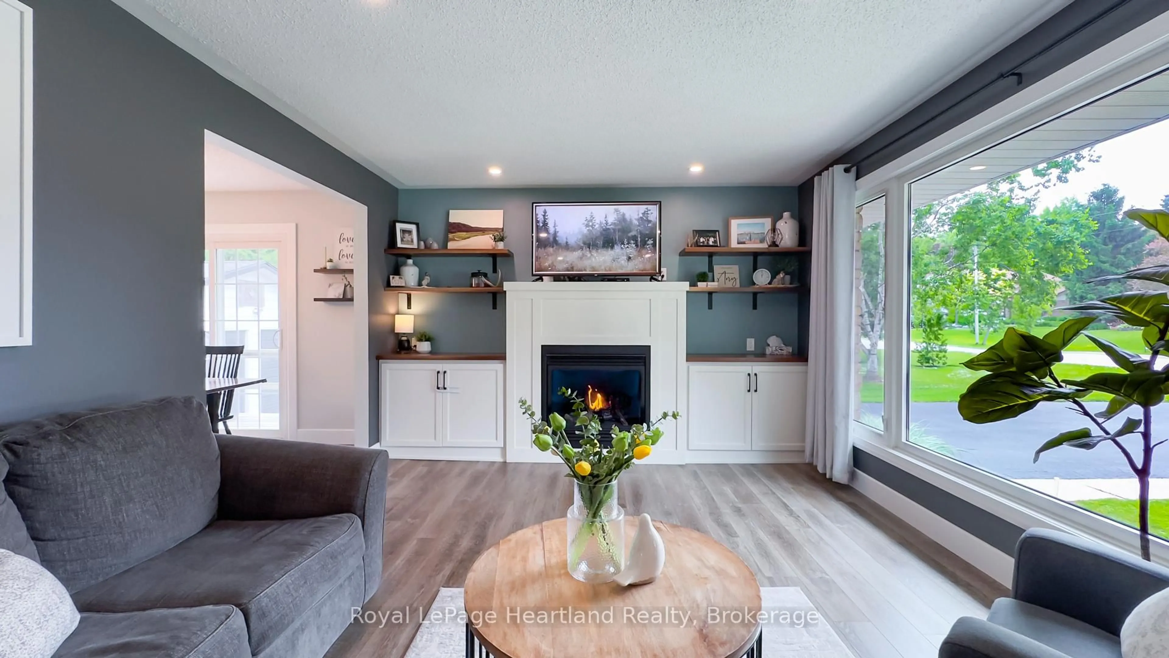 Living room with furniture, wood/laminate floor for 31 North St, Huron East Ontario N0K 1G0