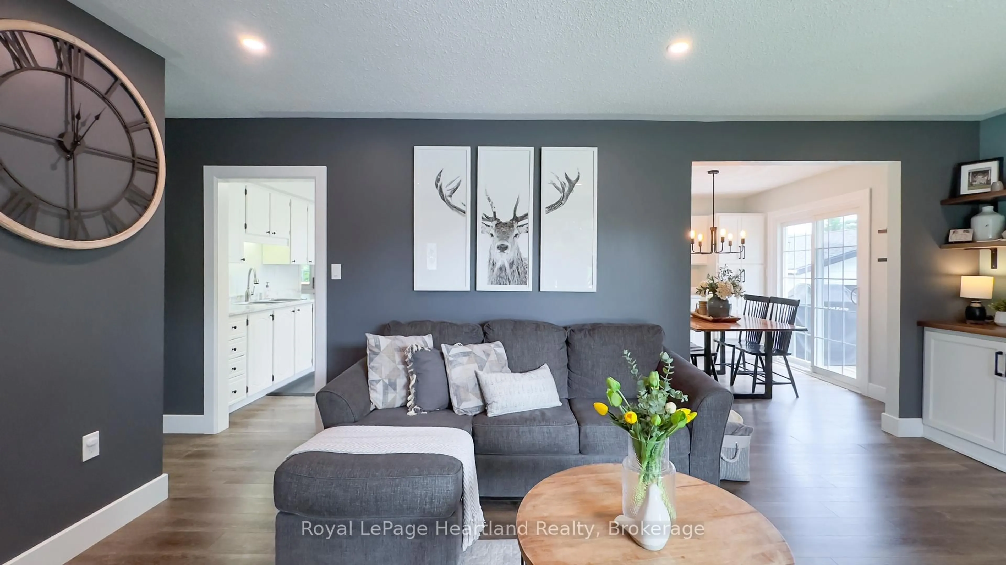 Living room with furniture, wood/laminate floor for 31 North St, Huron East Ontario N0K 1G0