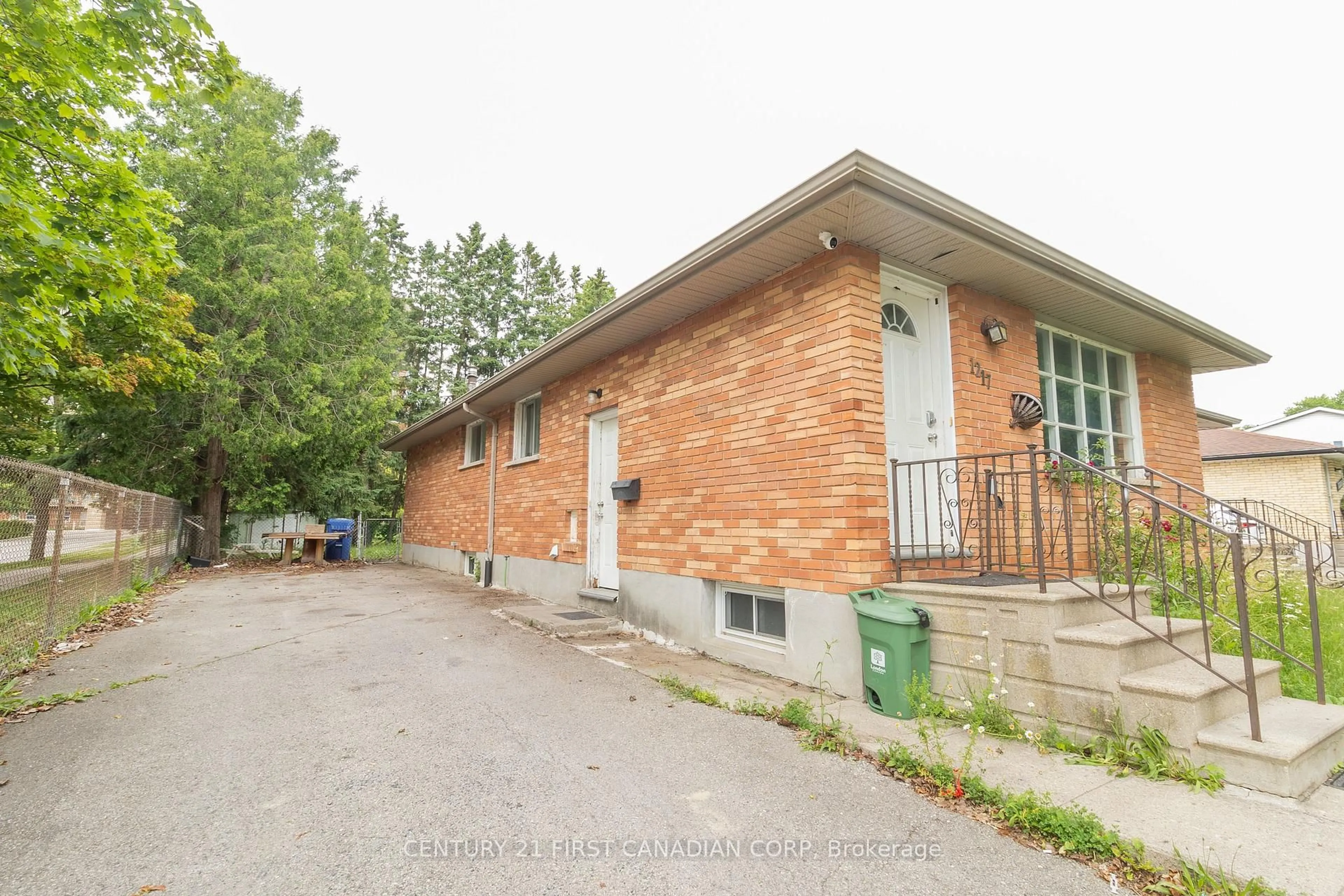Home with brick exterior material, street for 1217 Victoria Dr, London East Ontario N5Y 4E3