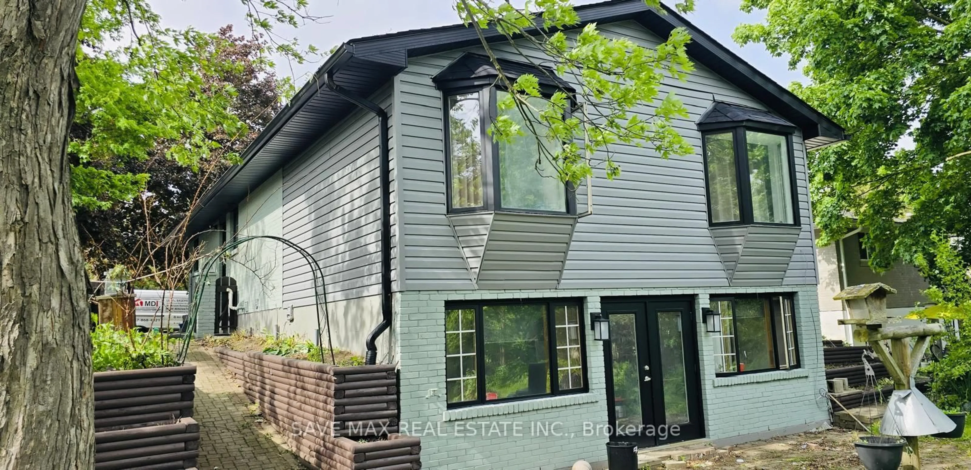 Home with vinyl exterior material, street for 56 Scott Rd, Cambridge Ontario N3C 2X4