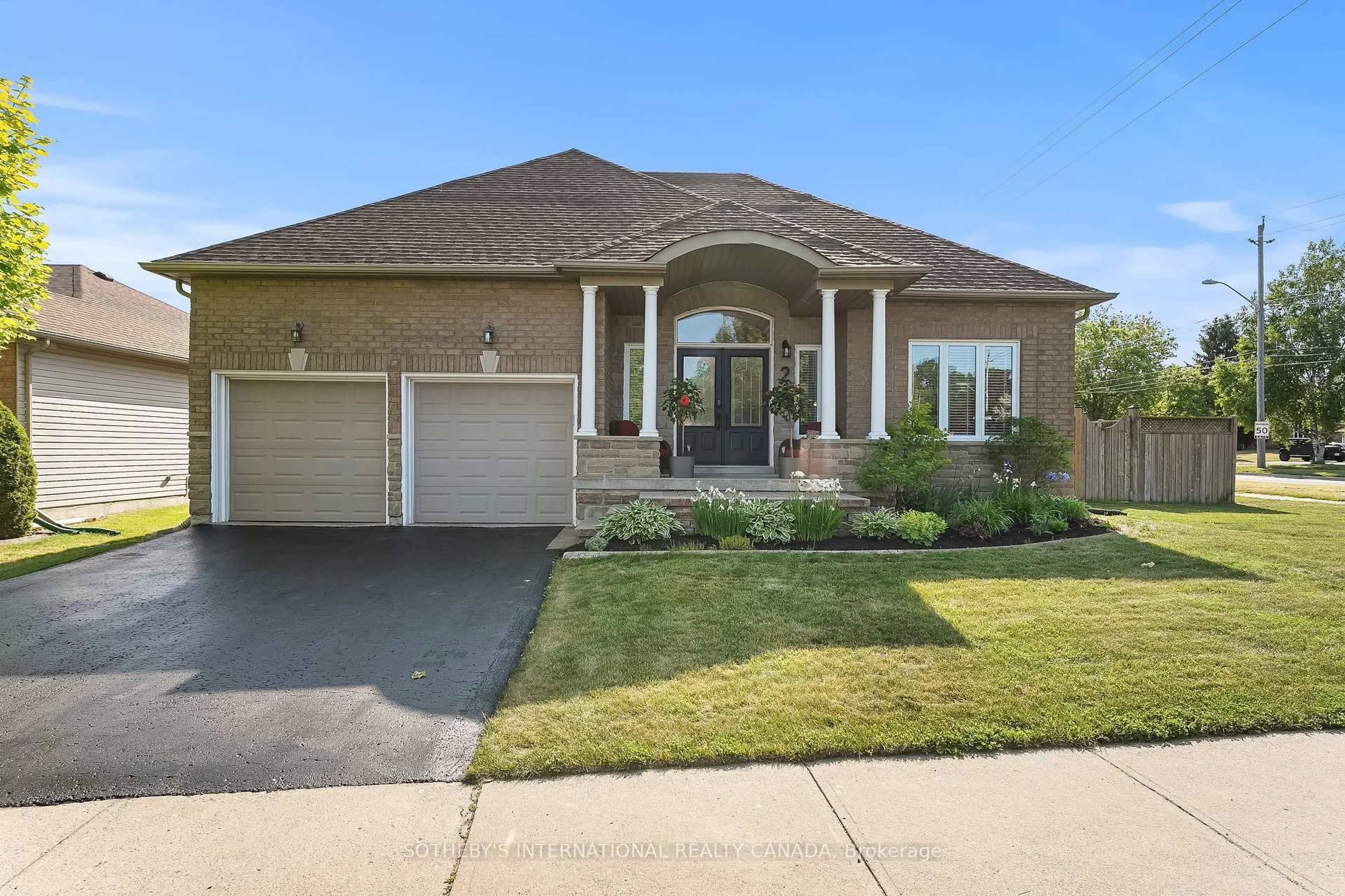 Home with brick exterior material, street for 2 Rapley Blvd, Port Hope Ontario L1A 4J7