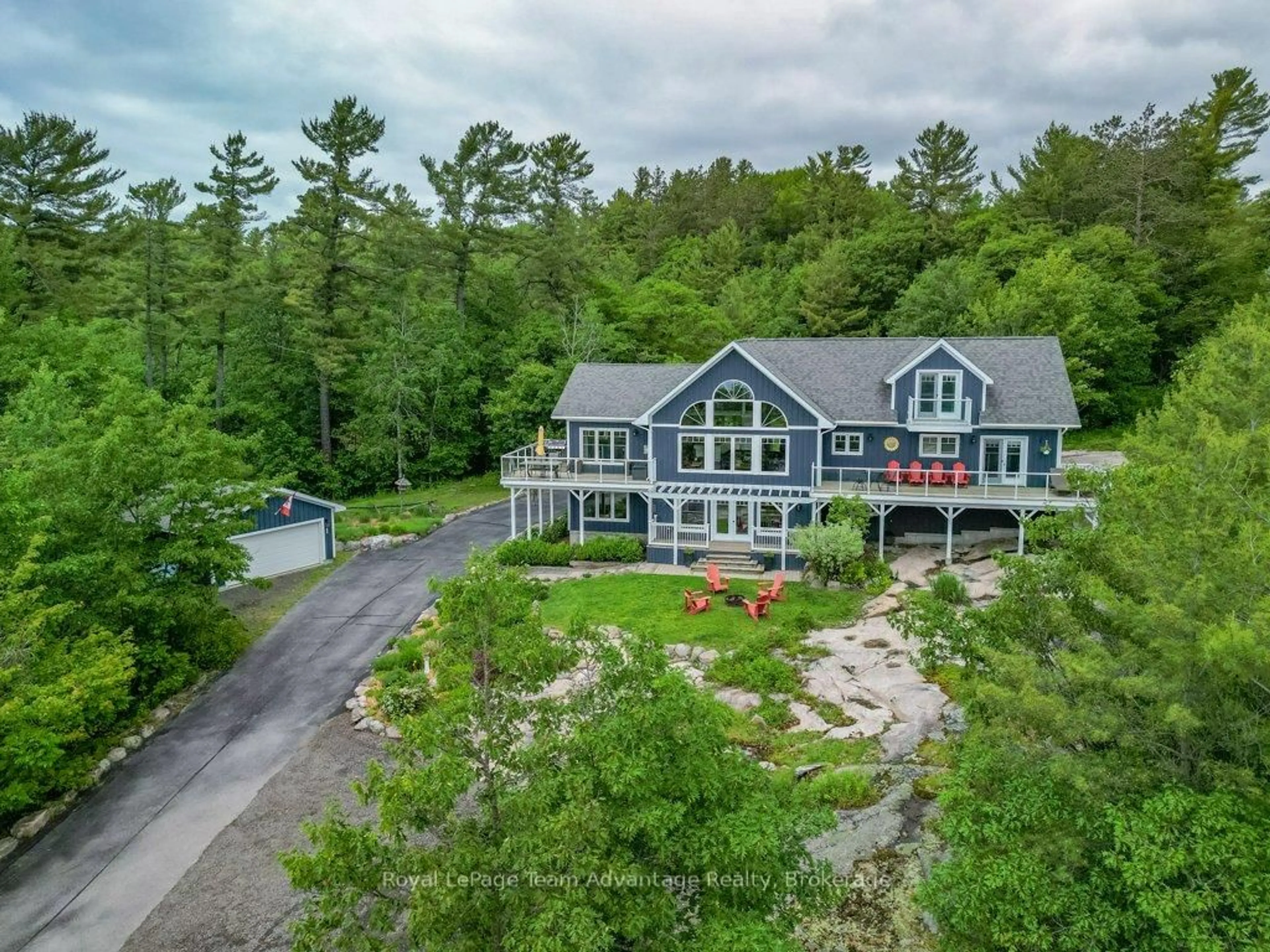 A pic from outside/outdoor area/front of a property/back of a property/a pic from drone, water/lake/river/ocean view for 39 Big Sound Rd, McDougall Ontario P0G 1G0