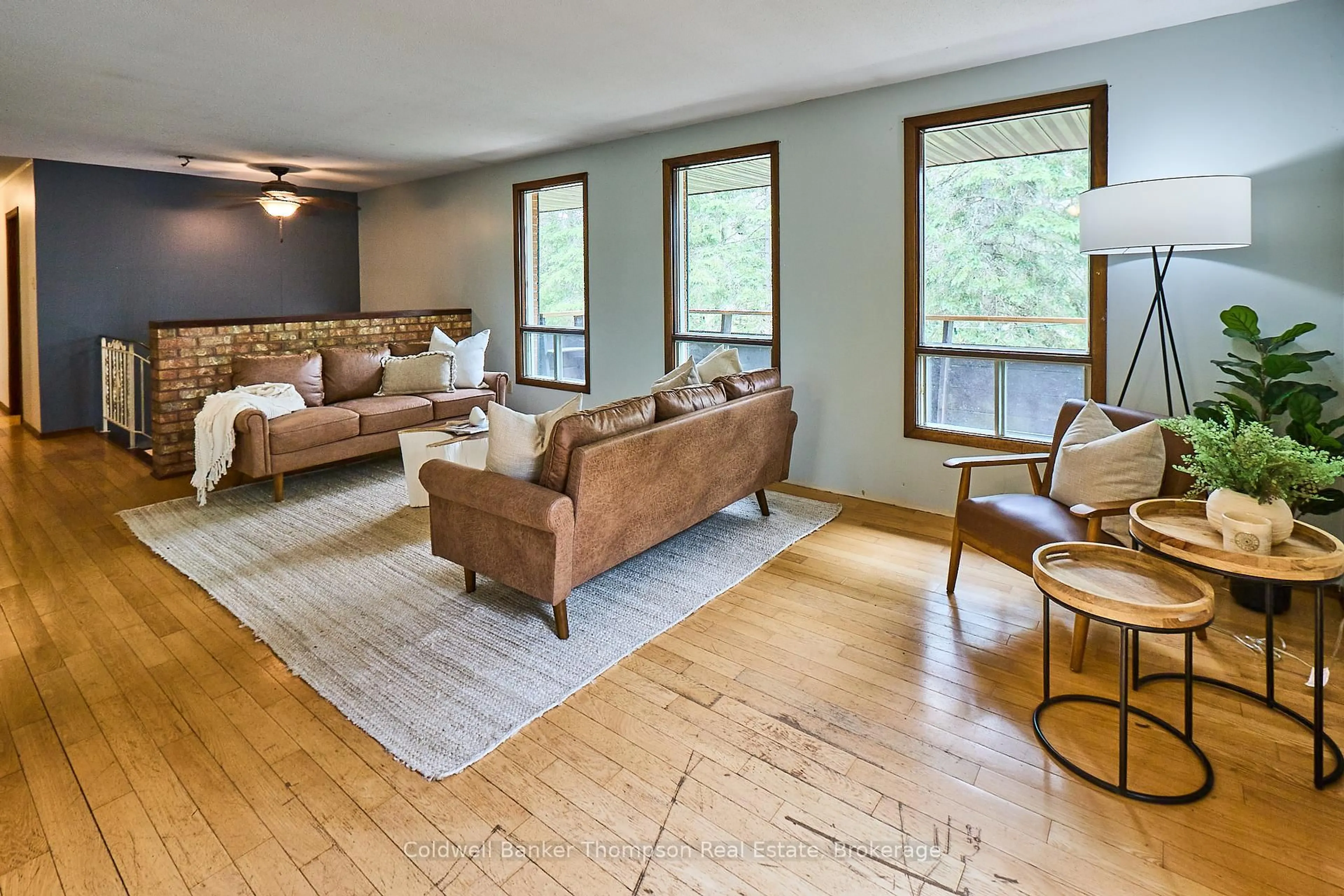 Living room with furniture, wood/laminate floor for 62 Savage Settlement Rd, Perry Ontario P0A 1R0
