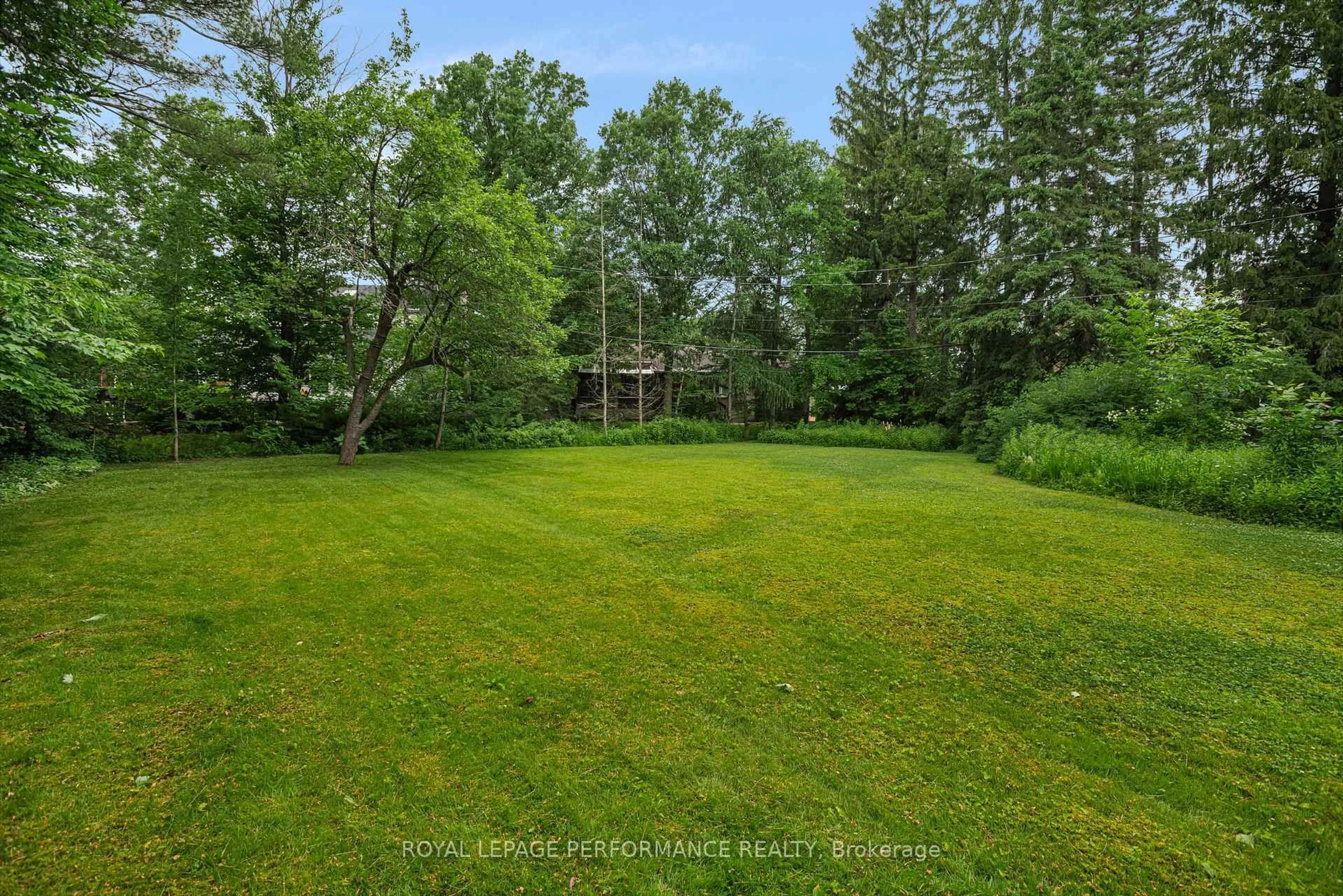 A pic from outside/outdoor area/front of a property/back of a property/a pic from drone, forest/trees view for 580 Allan St, Hawkesbury Ontario K6A 2M2