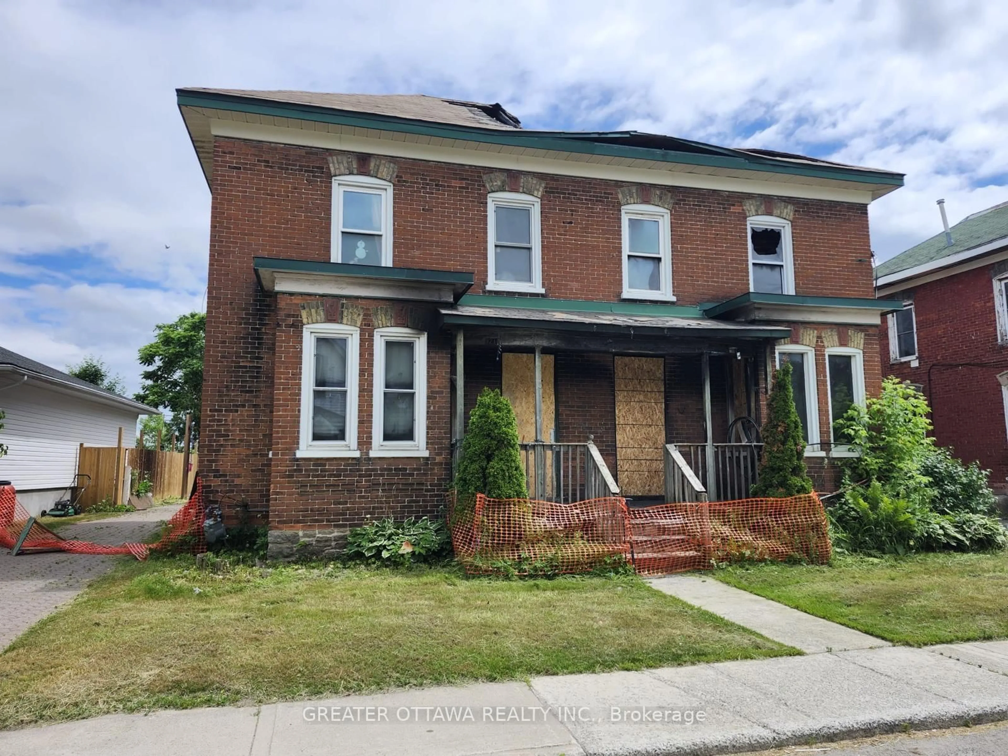 Home with brick exterior material, street for 19-21 Lanark St, Smiths Falls Ontario K7A 1K5