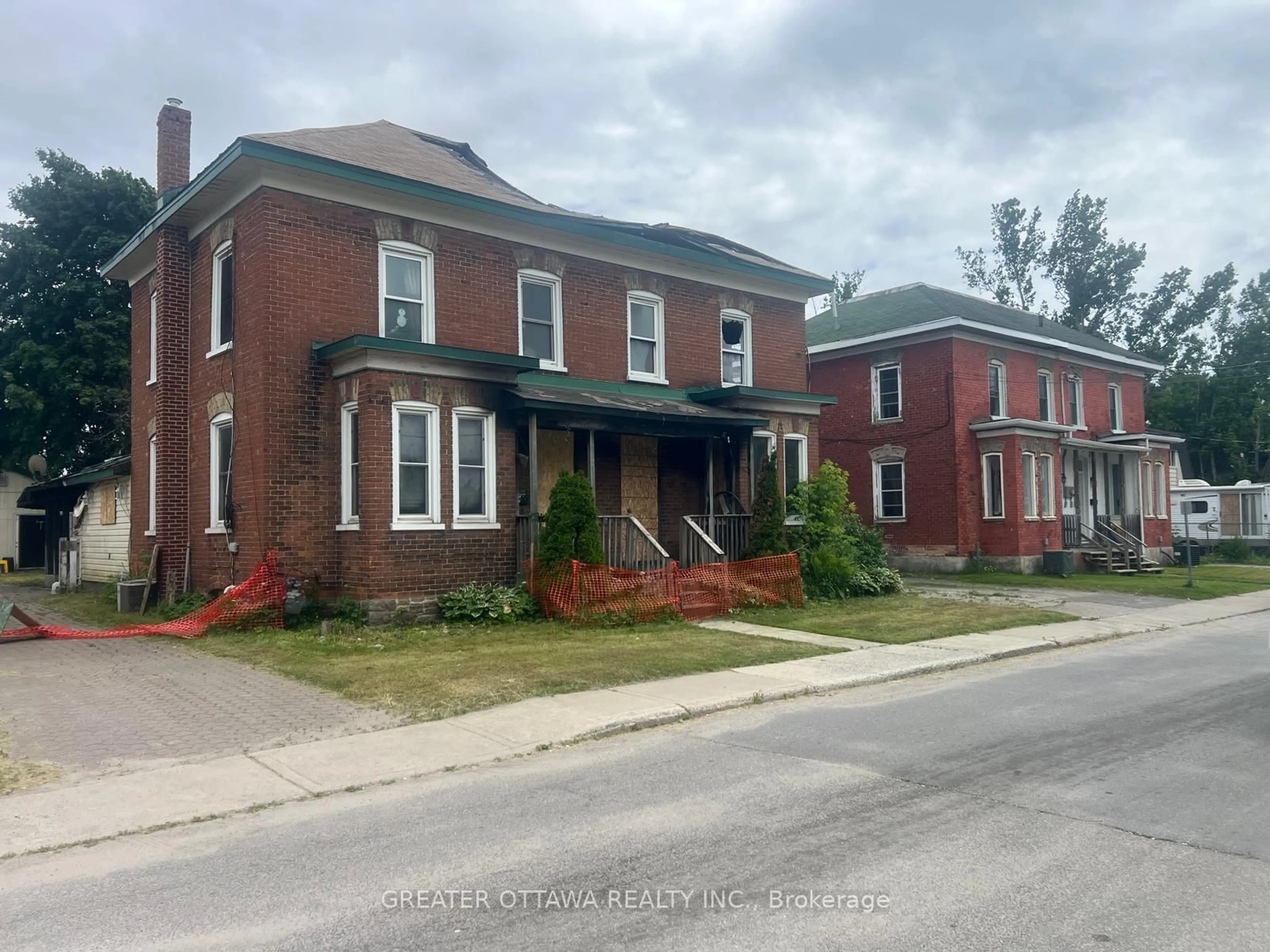 Home with brick exterior material, street for 19-21 Lanark St, Smiths Falls Ontario K7A 1K5