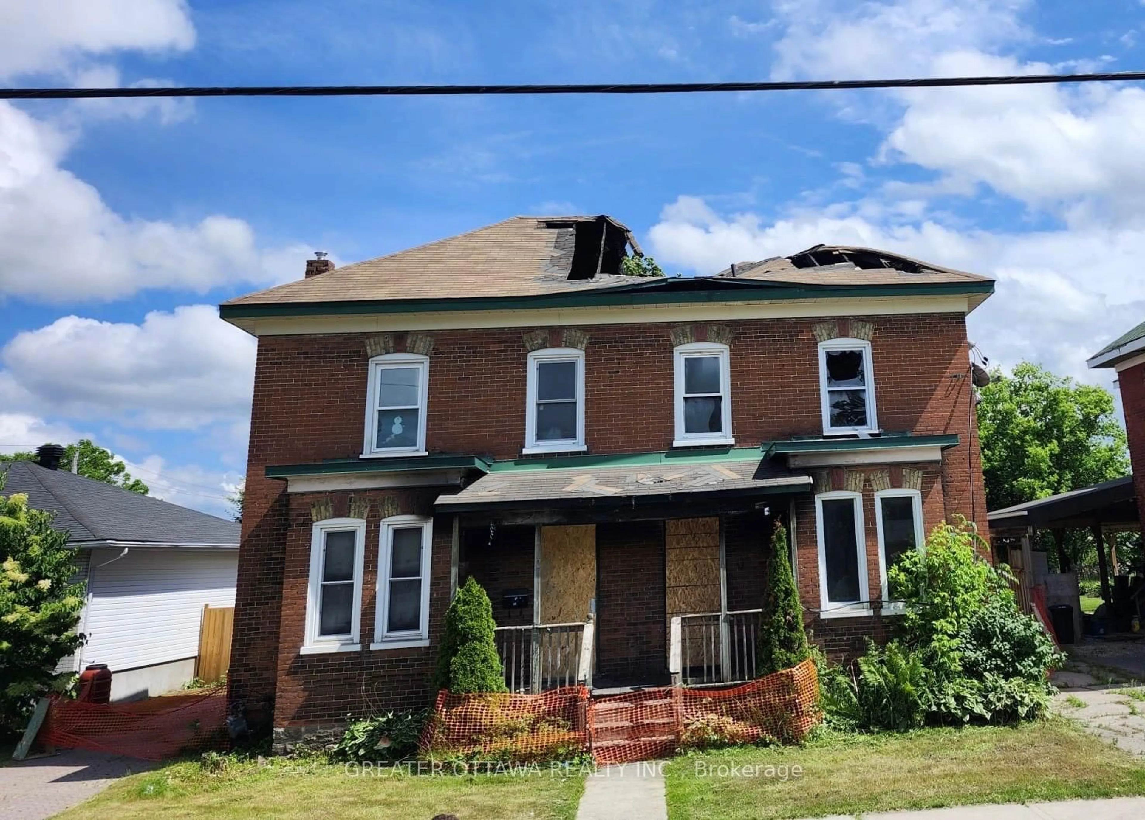 Home with brick exterior material, street for 19-21 Lanark St, Smiths Falls Ontario K7A 1K5