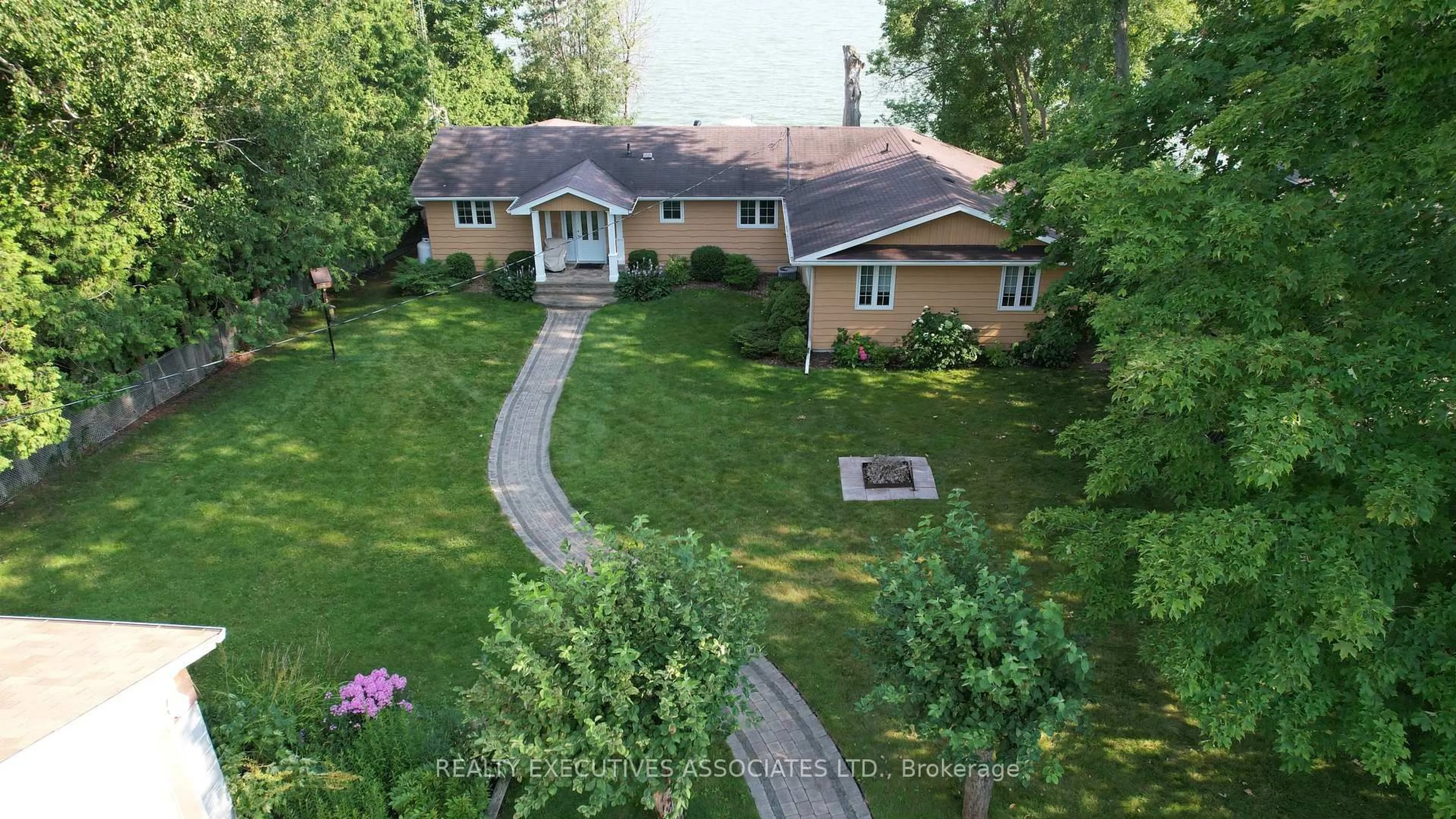 A pic from outside/outdoor area/front of a property/back of a property/a pic from drone, street for 22 Lakeview Blvd, Kawartha Lakes Ontario K0M 2C0