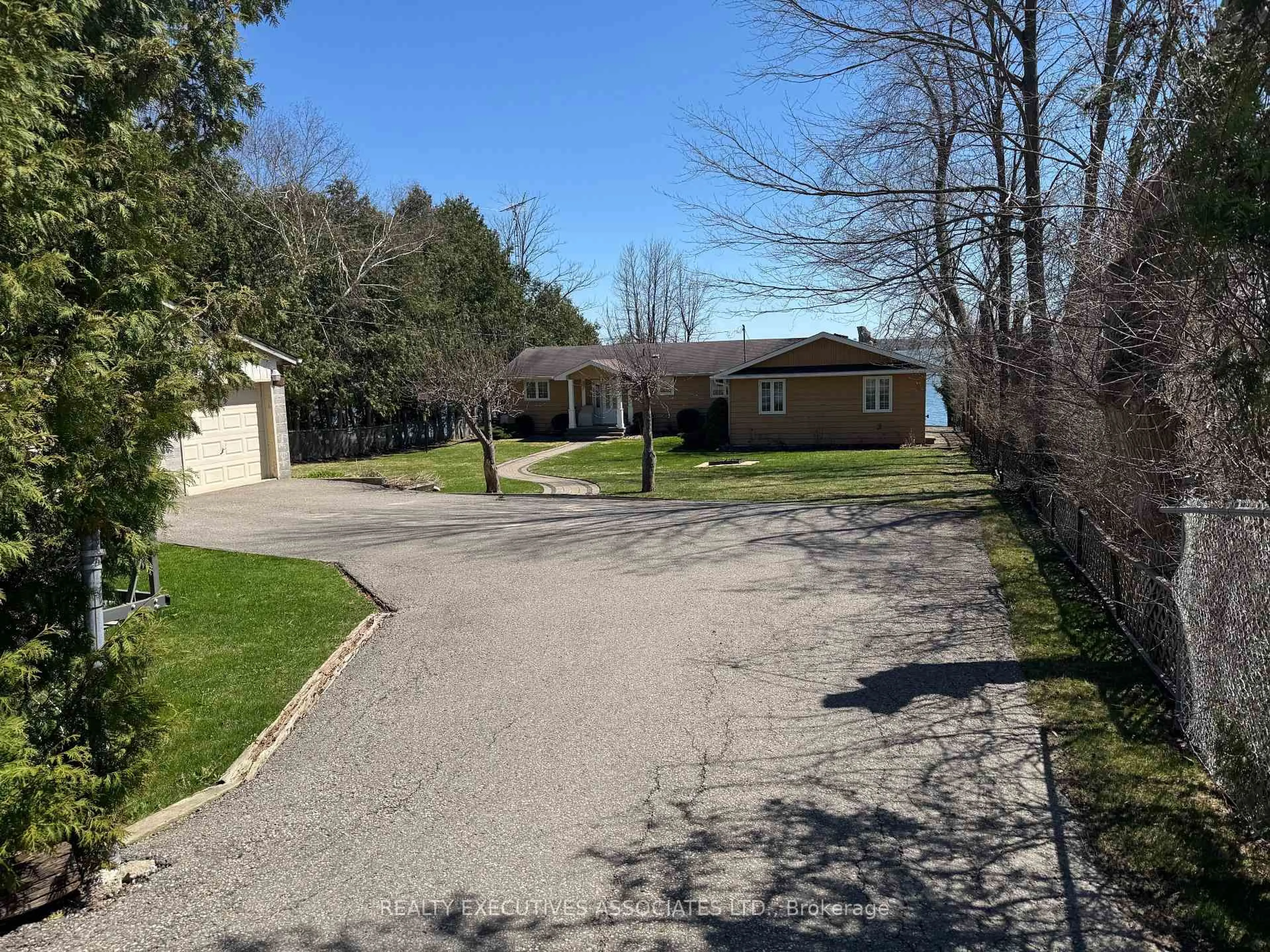A pic from outside/outdoor area/front of a property/back of a property/a pic from drone, street for 22 Lakeview Blvd, Kawartha Lakes Ontario K0M 2C0