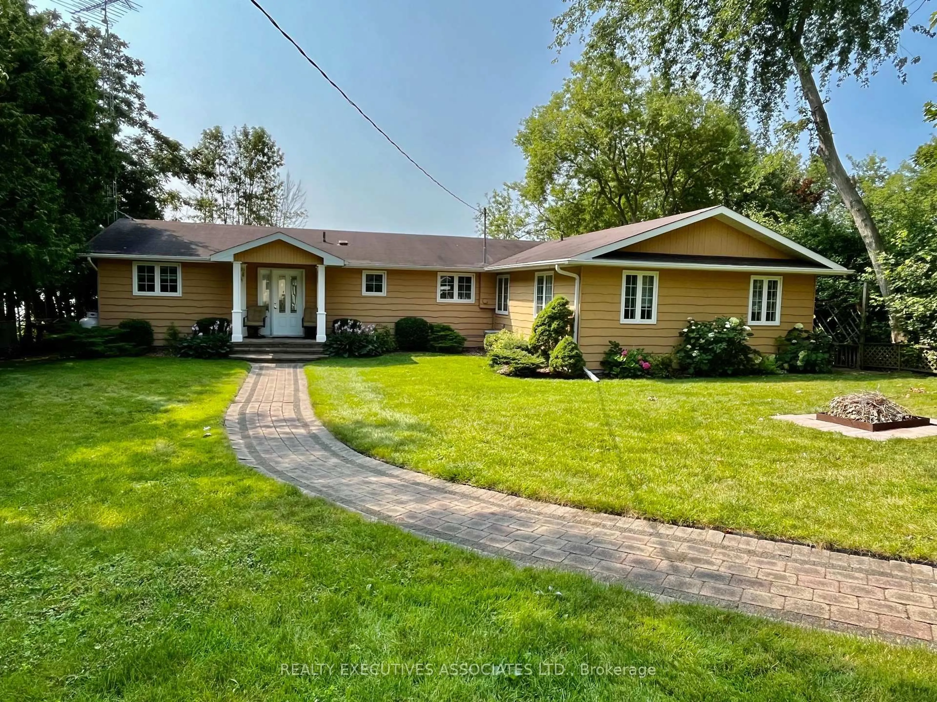 A pic from outside/outdoor area/front of a property/back of a property/a pic from drone, street for 22 Lakeview Blvd, Kawartha Lakes Ontario K0M 2C0